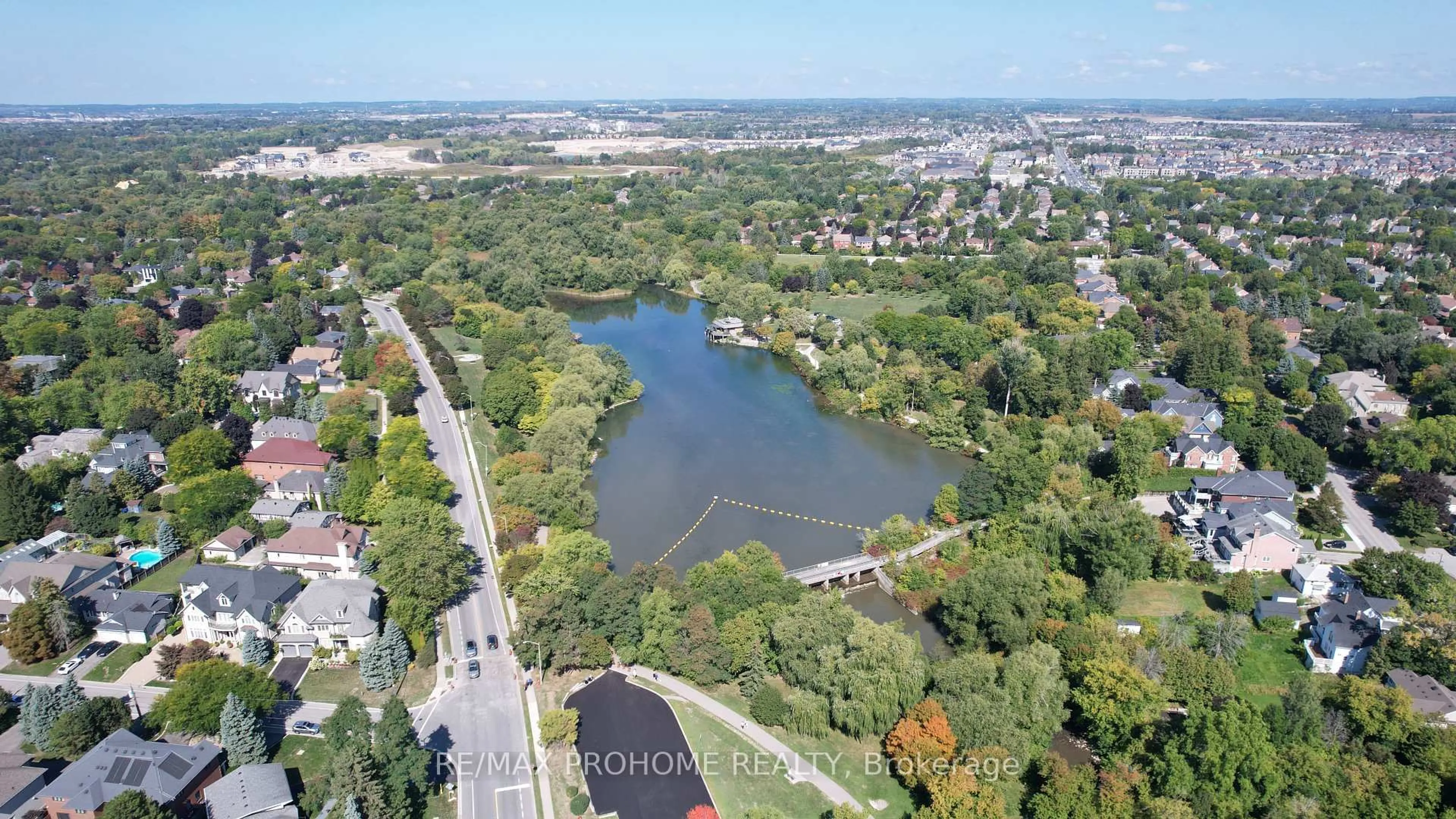 A pic from outside/outdoor area/front of a property/back of a property/a pic from drone, water/lake/river/ocean view for 17 Eckardt Ave, Markham Ontario L3R 1P1