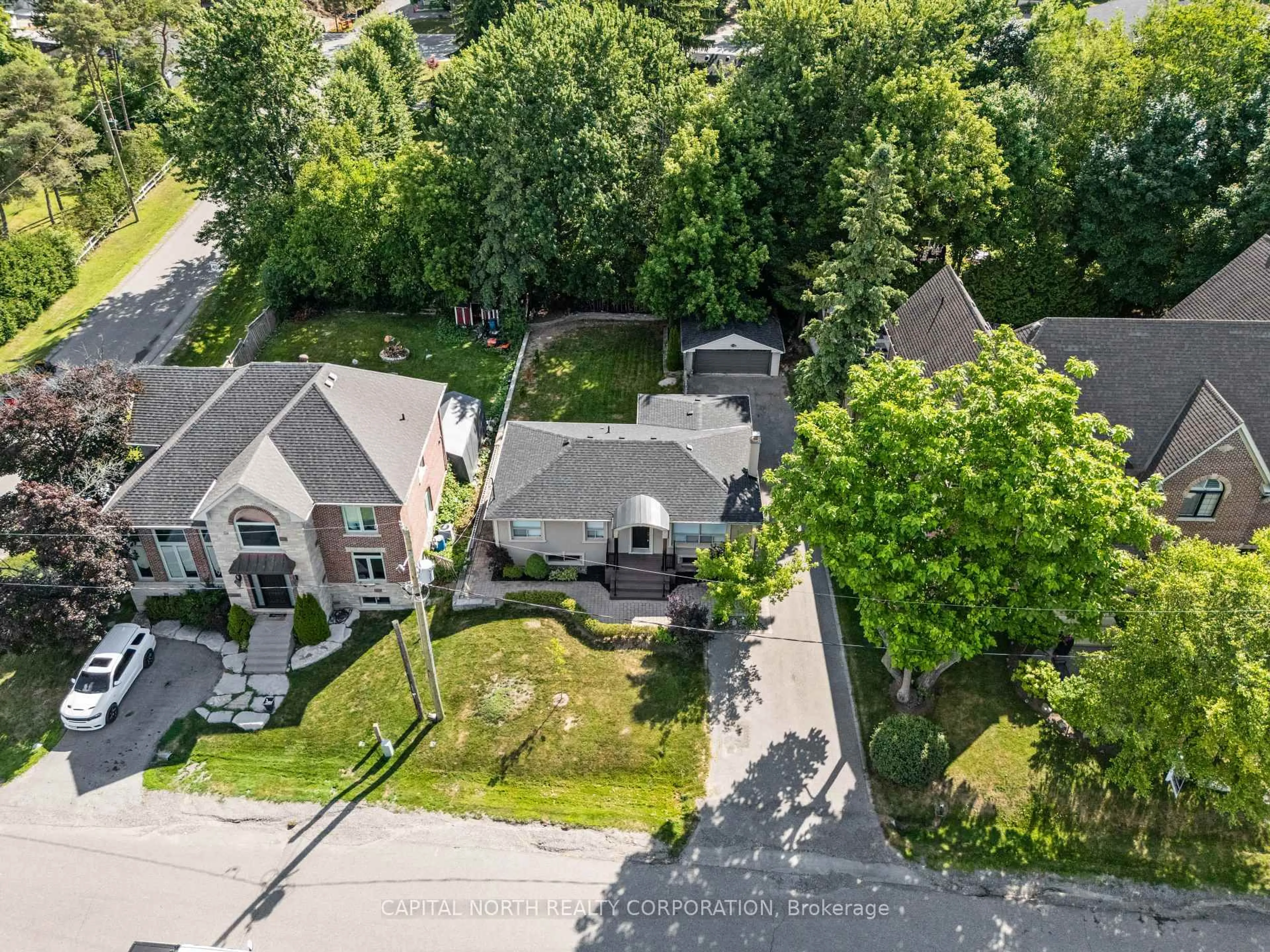 A pic from outside/outdoor area/front of a property/back of a property/a pic from drone, street for 89 Hambly Ave, King Ontario L7B 1J1