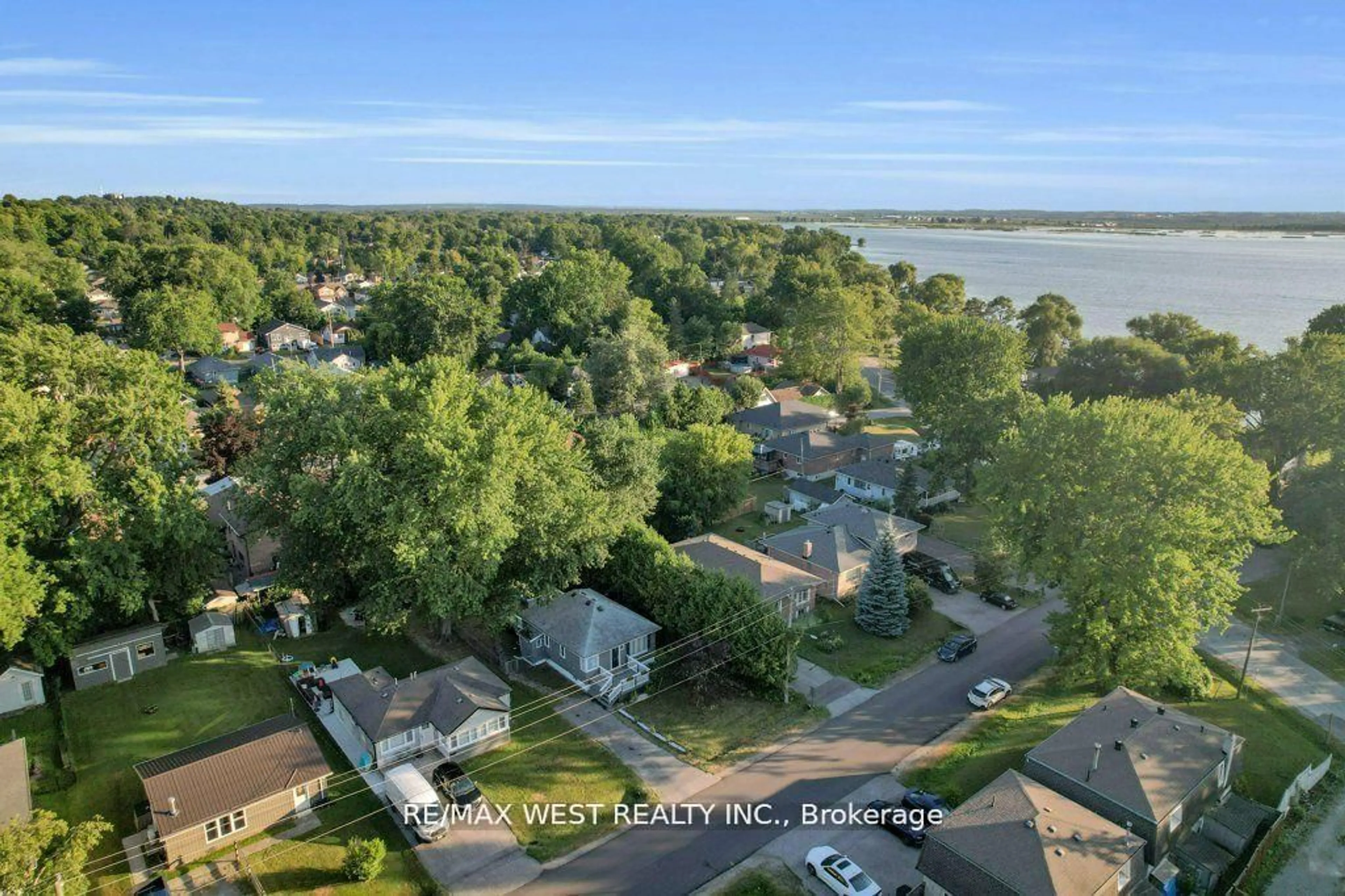 A pic from outside/outdoor area/front of a property/back of a property/a pic from drone, water/lake/river/ocean view for 275 Pine Beach Dr, Georgina Ontario L4P 2V7