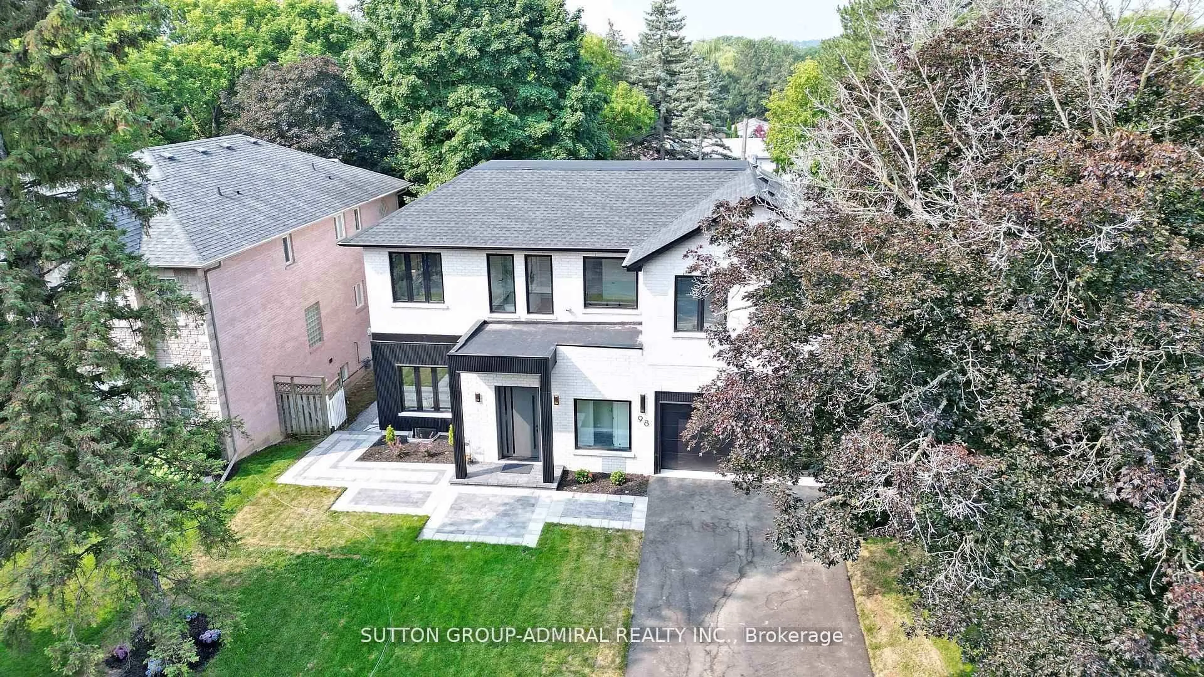 A pic from outside/outdoor area/front of a property/back of a property/a pic from drone, street for 98 Babcombe Dr, Markham Ontario L3T 1N1