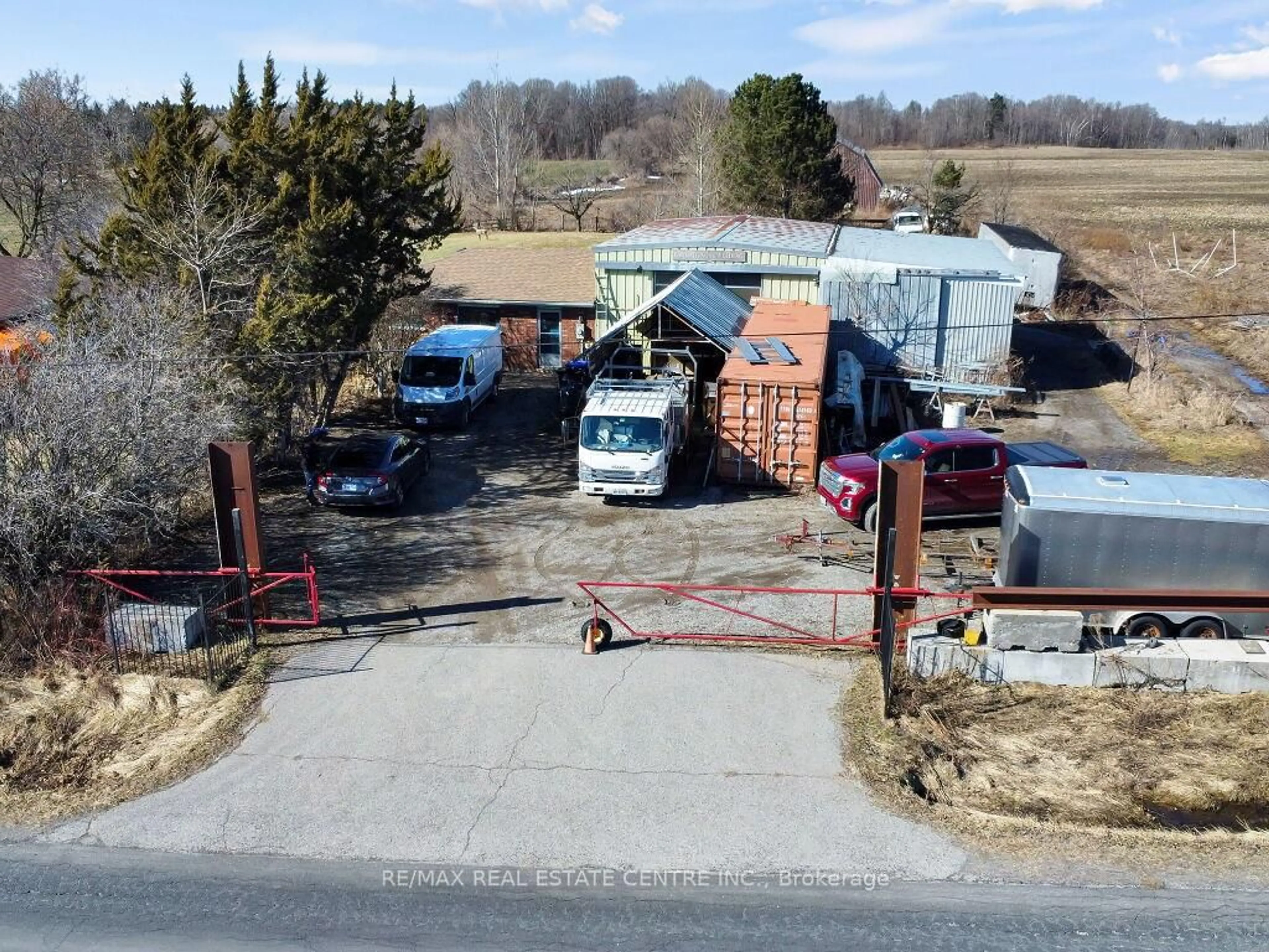 A pic from outside/outdoor area/front of a property/back of a property/a pic from drone, street for 6422 9th Line, New Tecumseth Ontario L0G 1A0