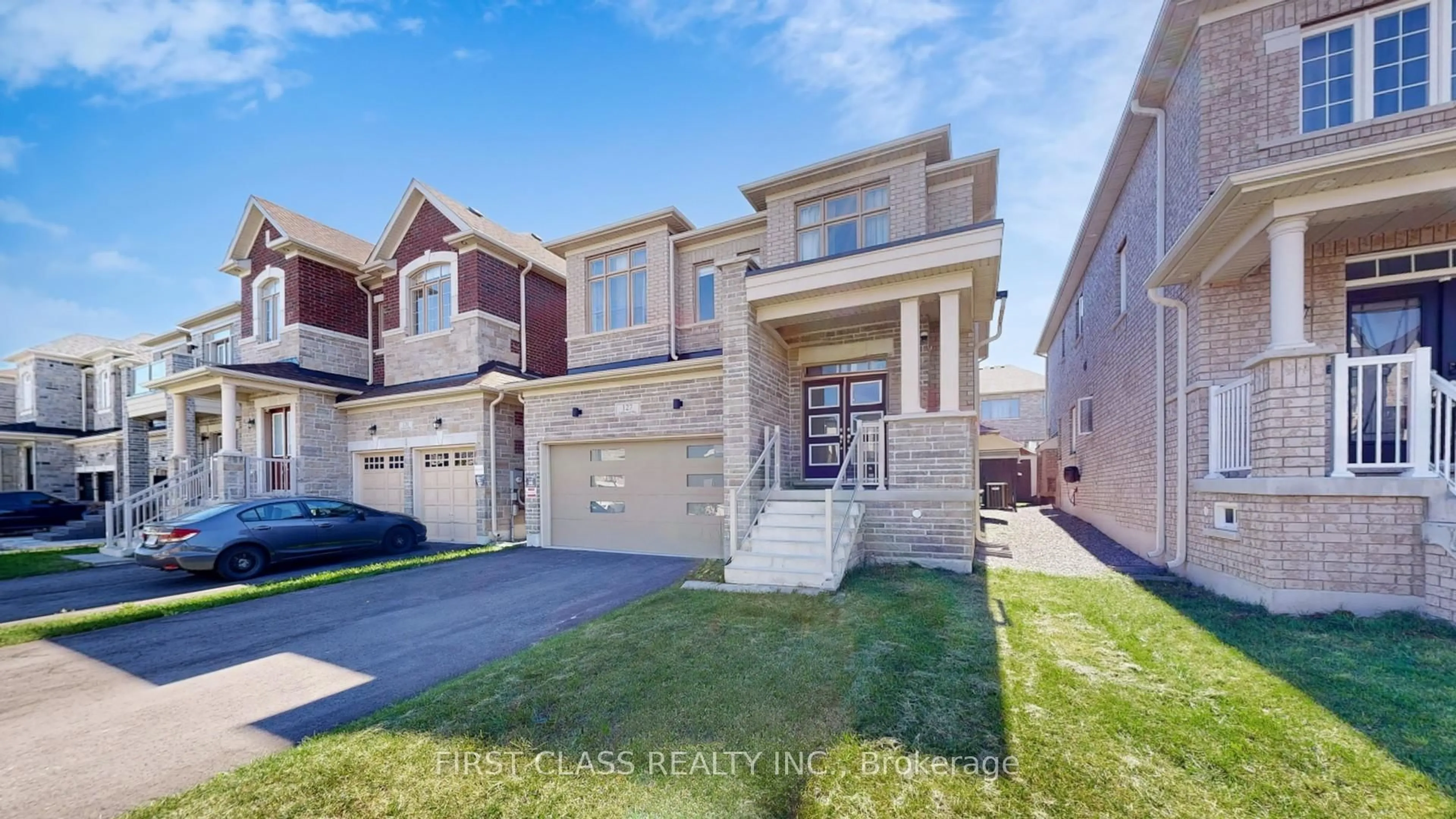 Home with brick exterior material, street for 127 Fallharvest Way, Whitchurch-Stouffville Ontario L4A 0R8