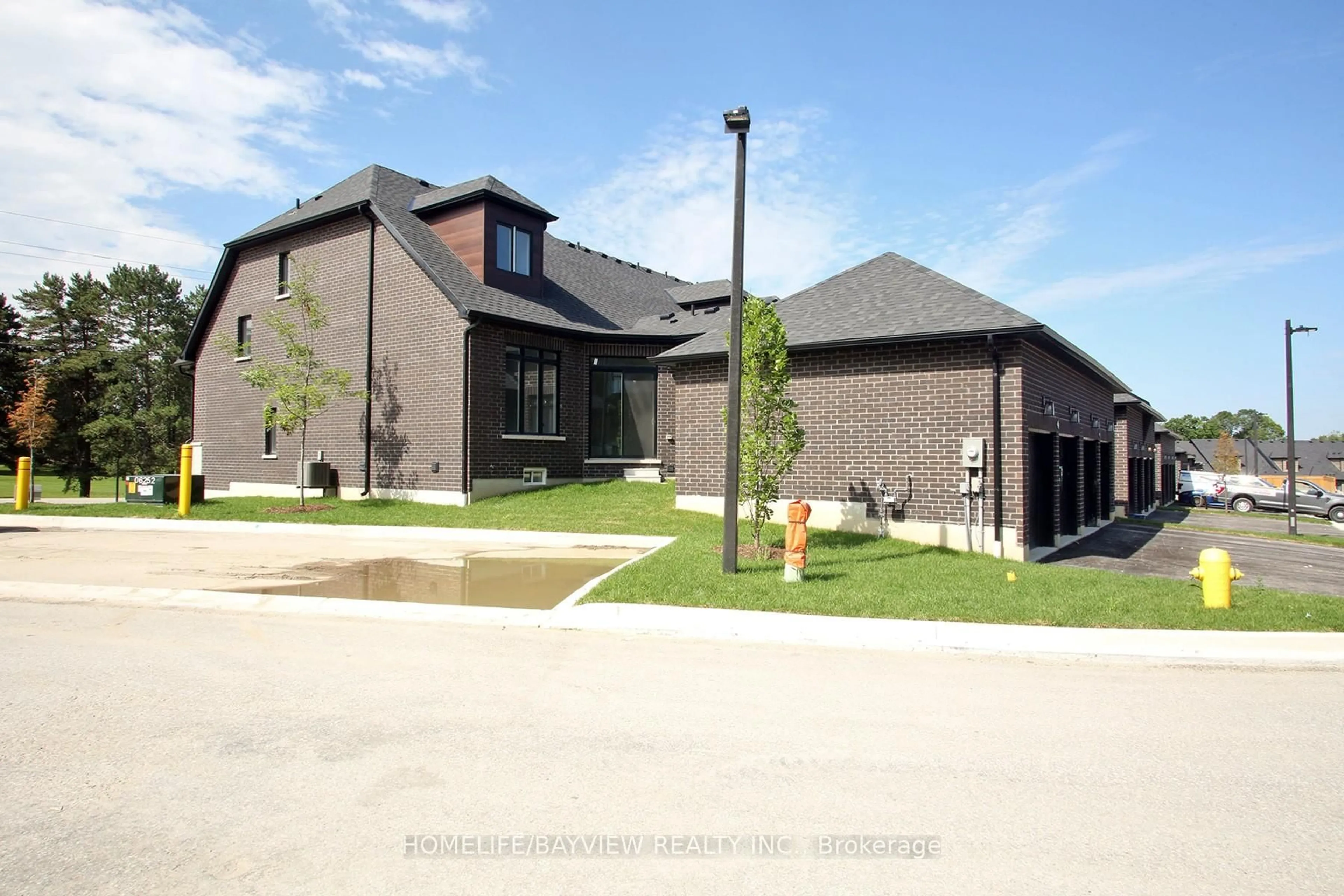 Home with brick exterior material, street for 2 Vern Robertson Gate, Uxbridge Ontario L9P 0R9