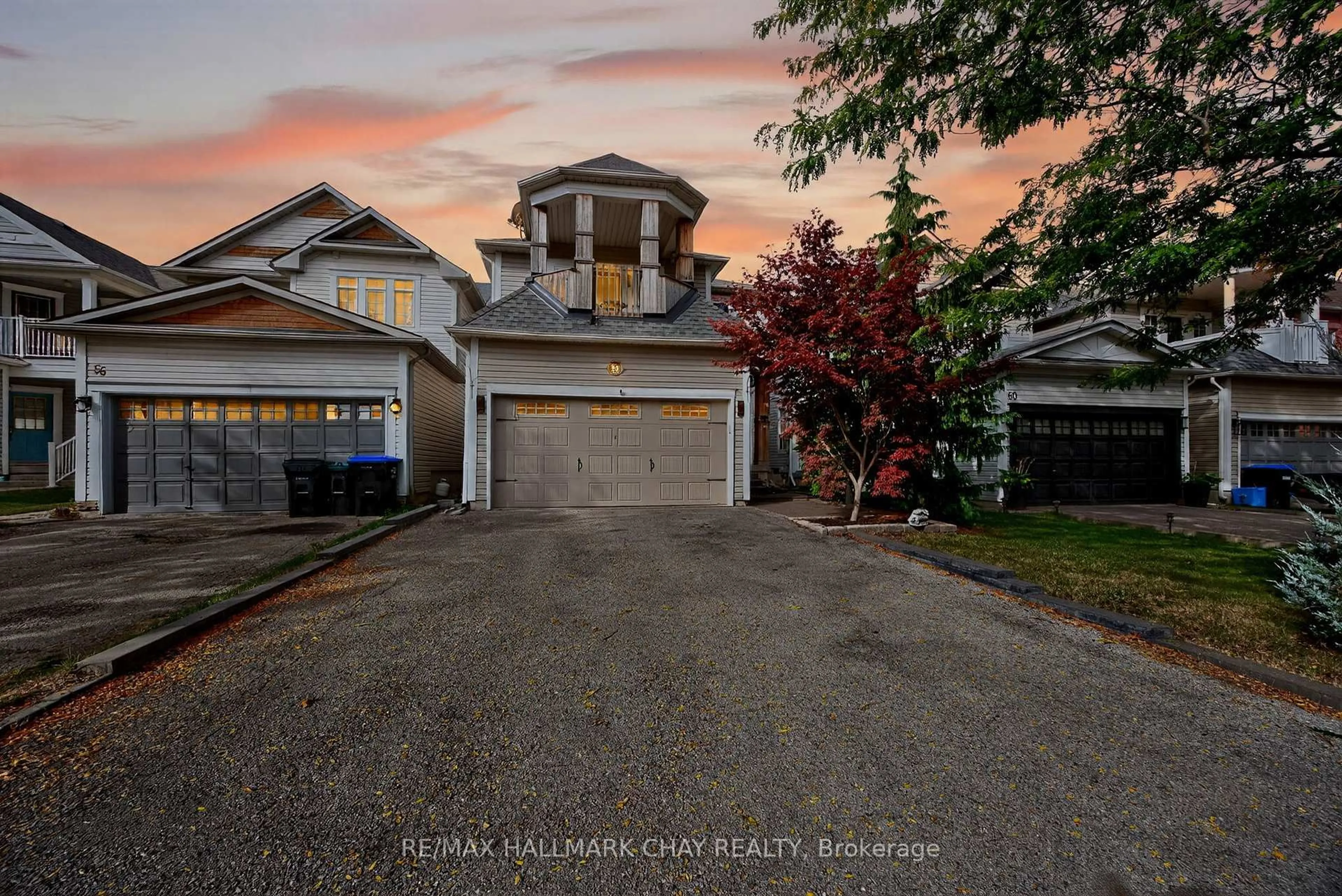 A pic from outside/outdoor area/front of a property/back of a property/a pic from drone, street for 58 McCurdy Dr, New Tecumseth Ontario L0G 1W0