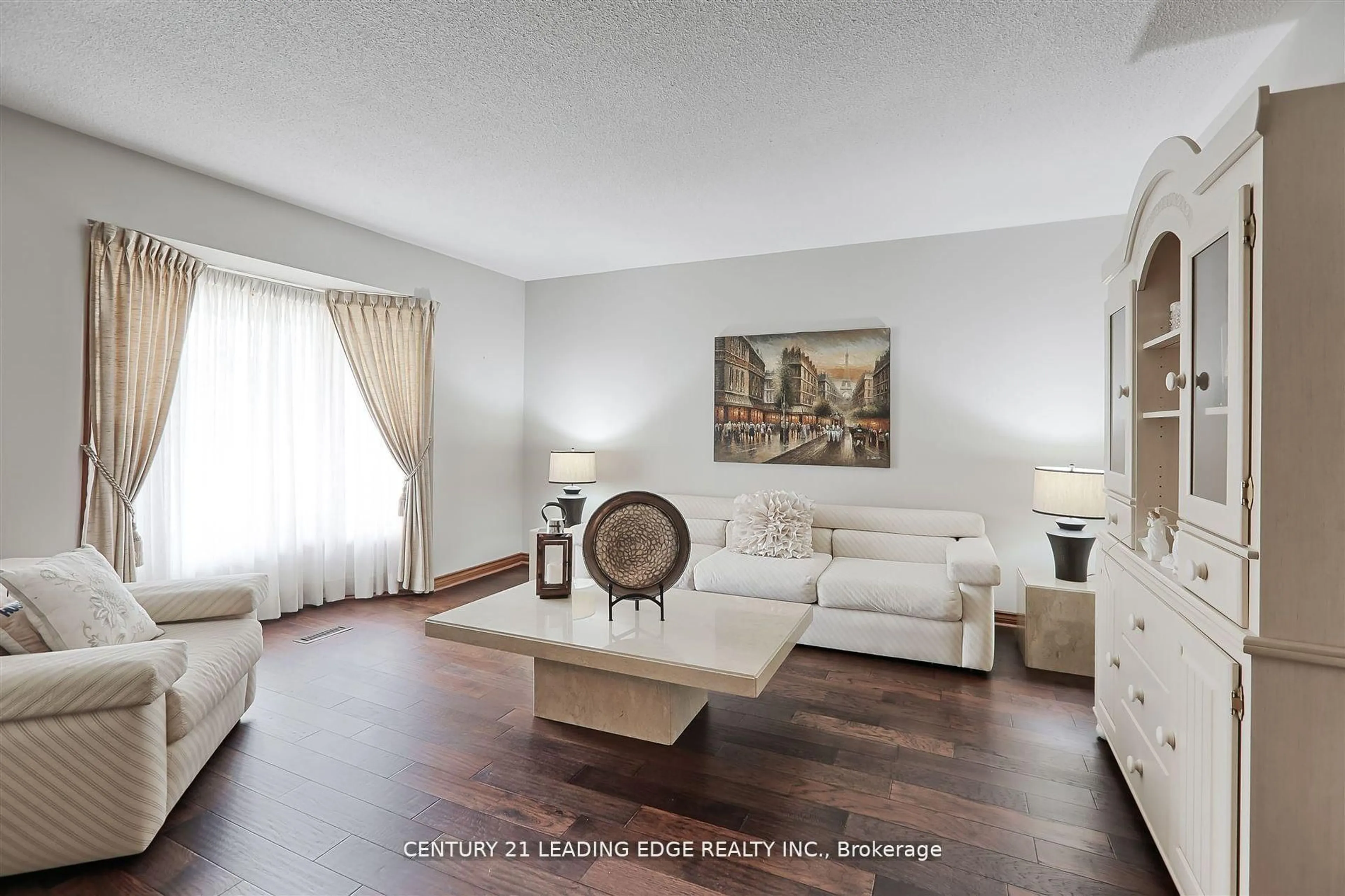 Living room with furniture, wood/laminate floor for 312 Valeria Blvd, Vaughan Ontario L4L 6V7