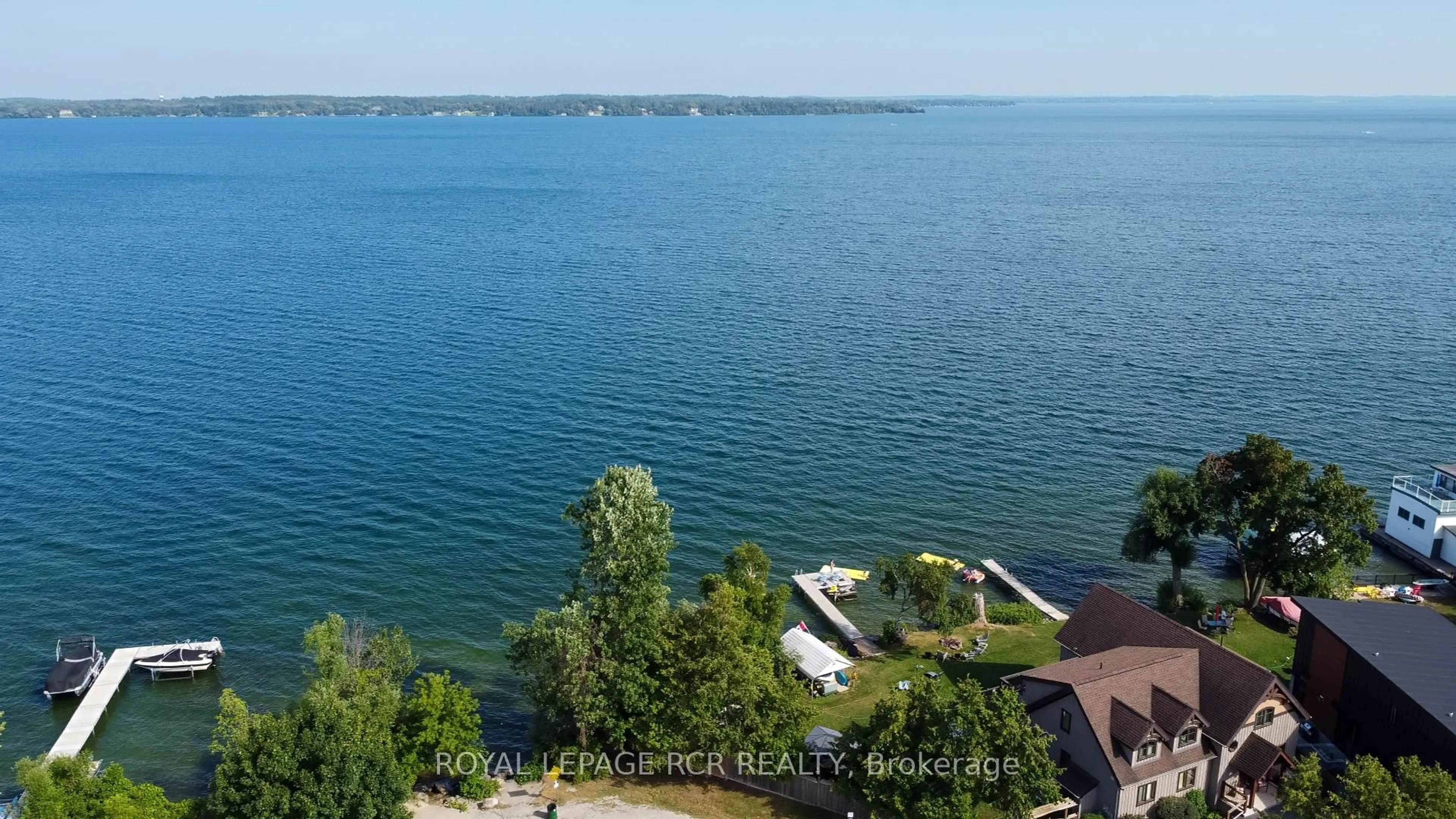 A pic from outside/outdoor area/front of a property/back of a property/a pic from drone, water/lake/river/ocean view for 1526 Houston Ave, Innisfil Ontario L9S 4M7