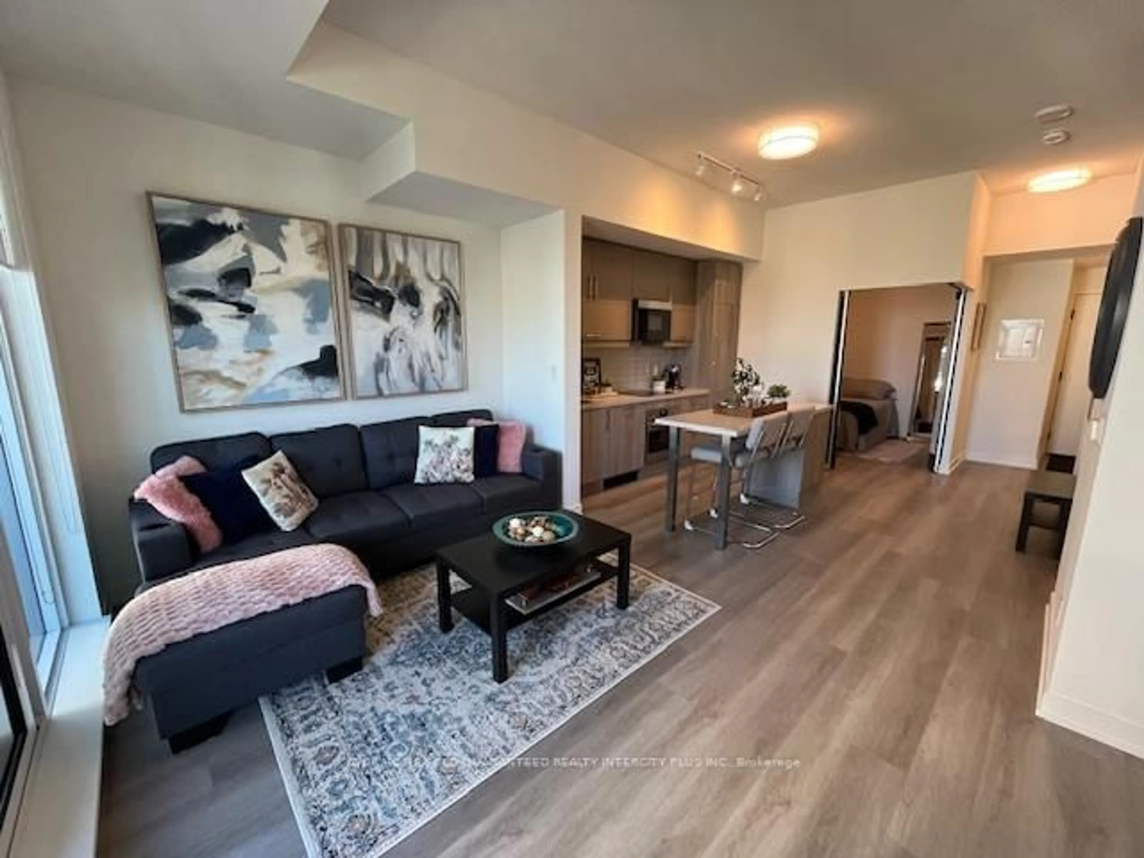 Living room with furniture, unknown for 8119 Birchmount Rd #A1028, Markham Ontario L6G 0H6