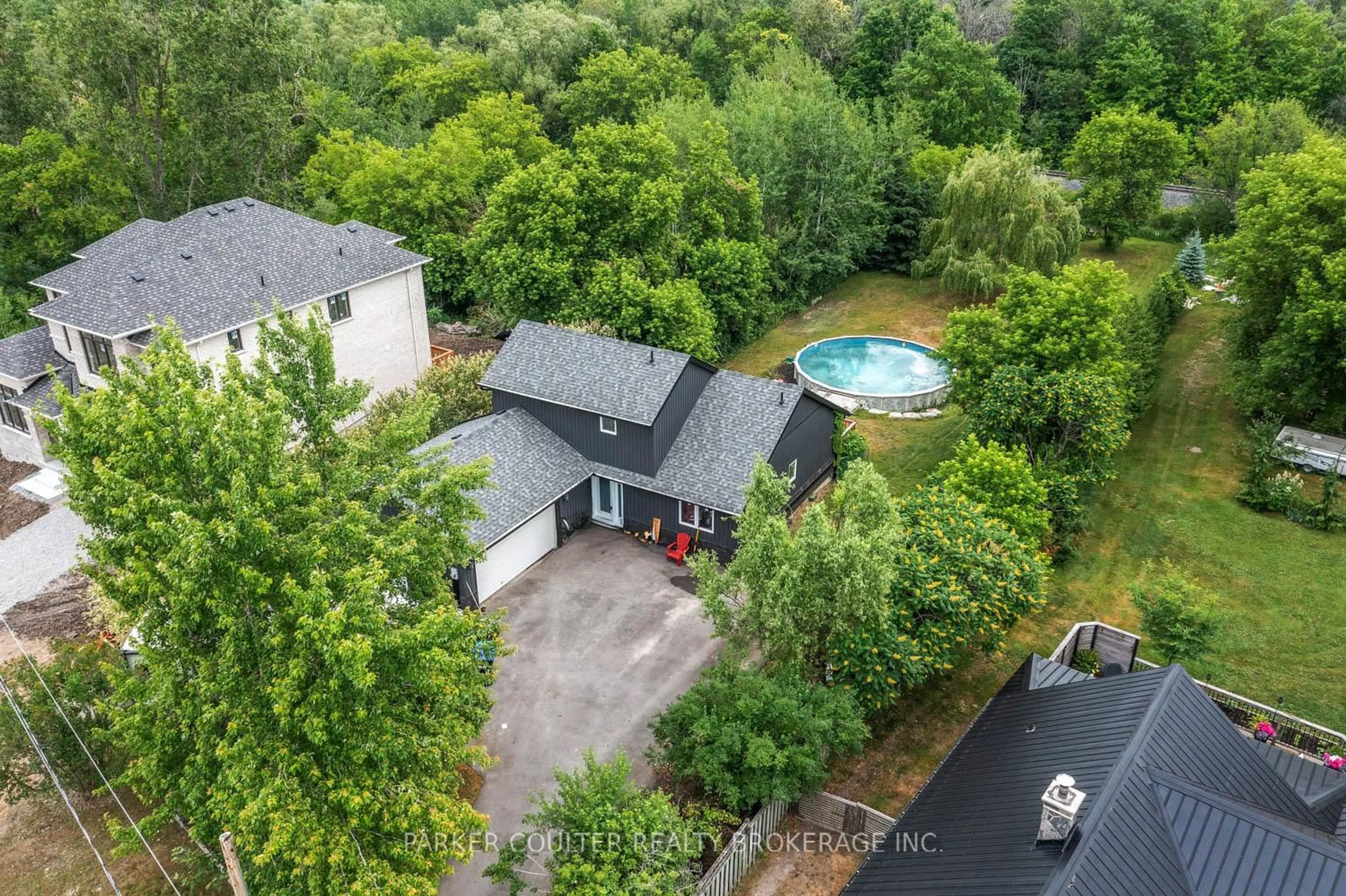 A pic from outside/outdoor area/front of a property/back of a property/a pic from drone, unknown for 973 Church Dr, Innisfil Ontario L0L 1W0