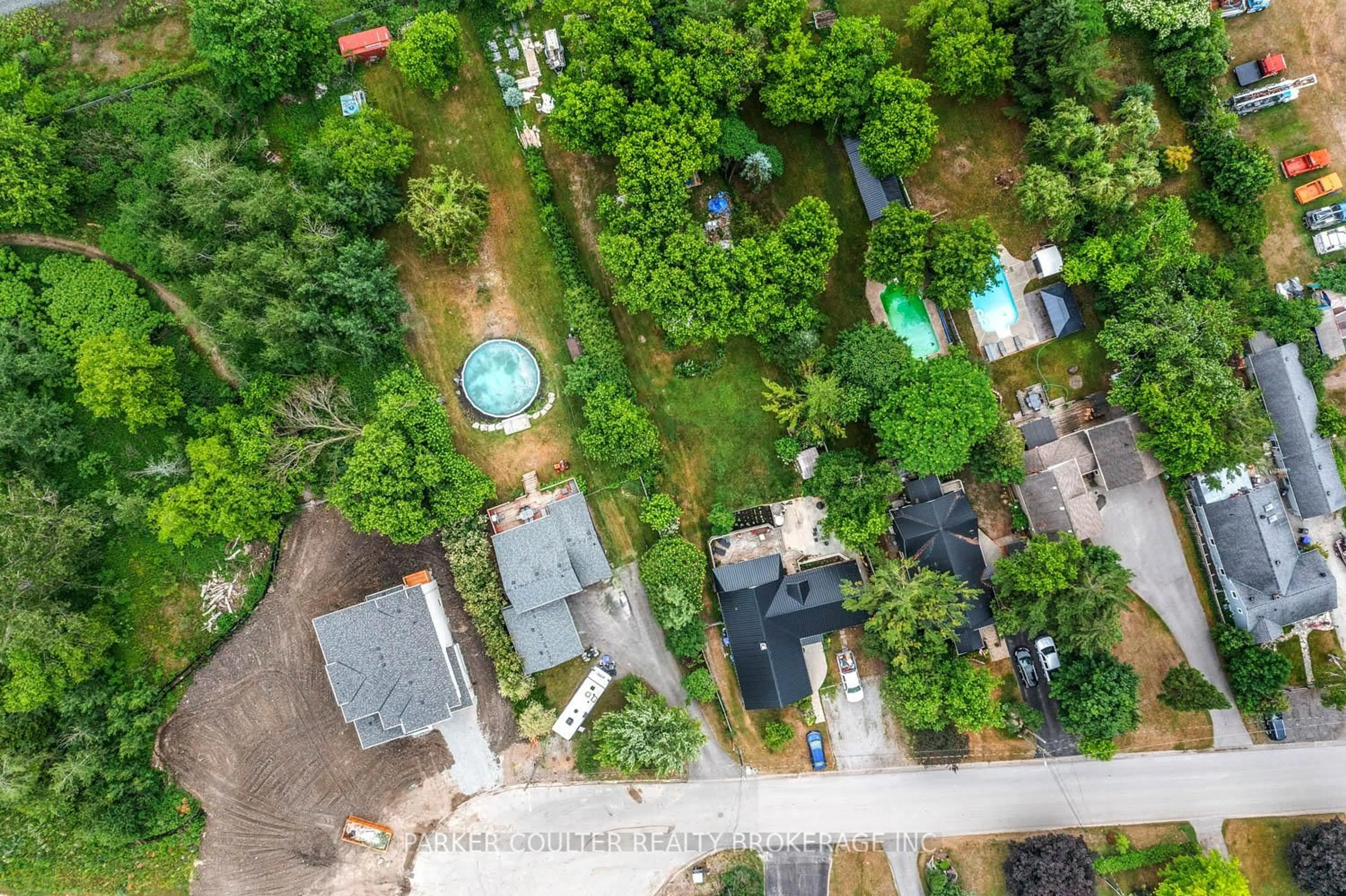 A pic from outside/outdoor area/front of a property/back of a property/a pic from drone, street for 973 Church Dr, Innisfil Ontario L0L 1W0