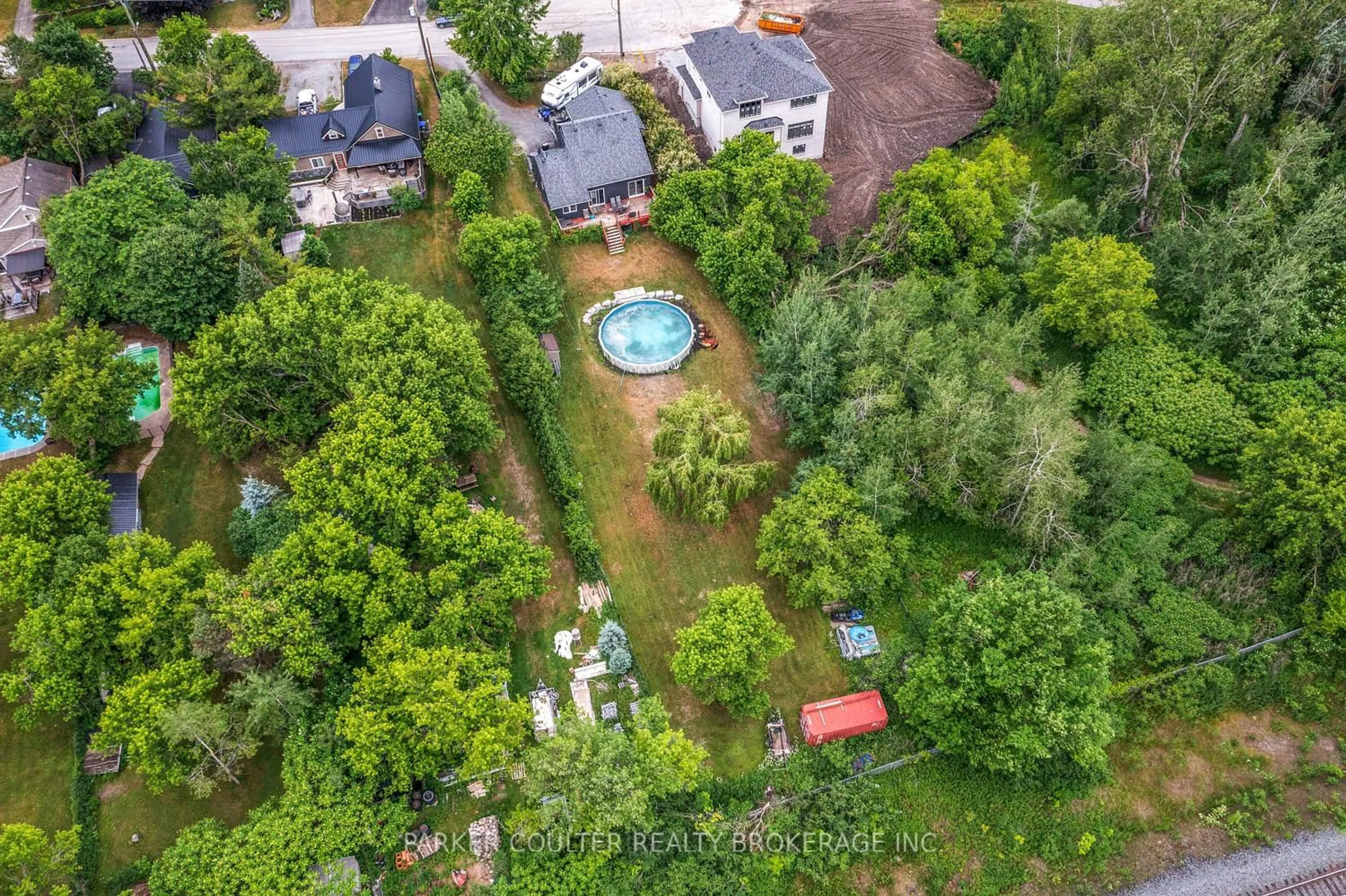A pic from outside/outdoor area/front of a property/back of a property/a pic from drone, unknown for 973 Church Dr, Innisfil Ontario L0L 1W0