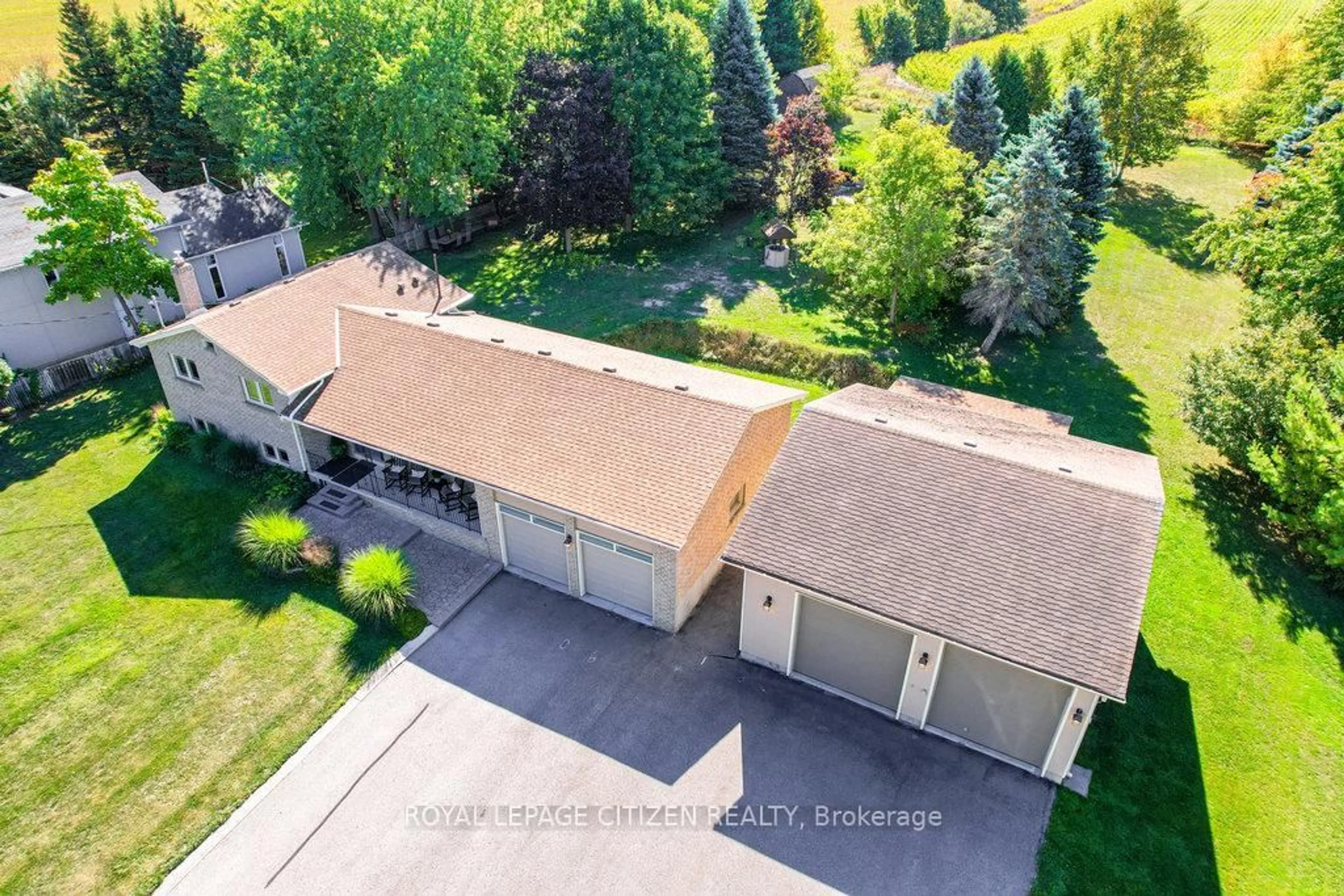 A pic from outside/outdoor area/front of a property/back of a property/a pic from drone, mountain view for 7079 6th Line, New Tecumseth Ontario L0G 1W0