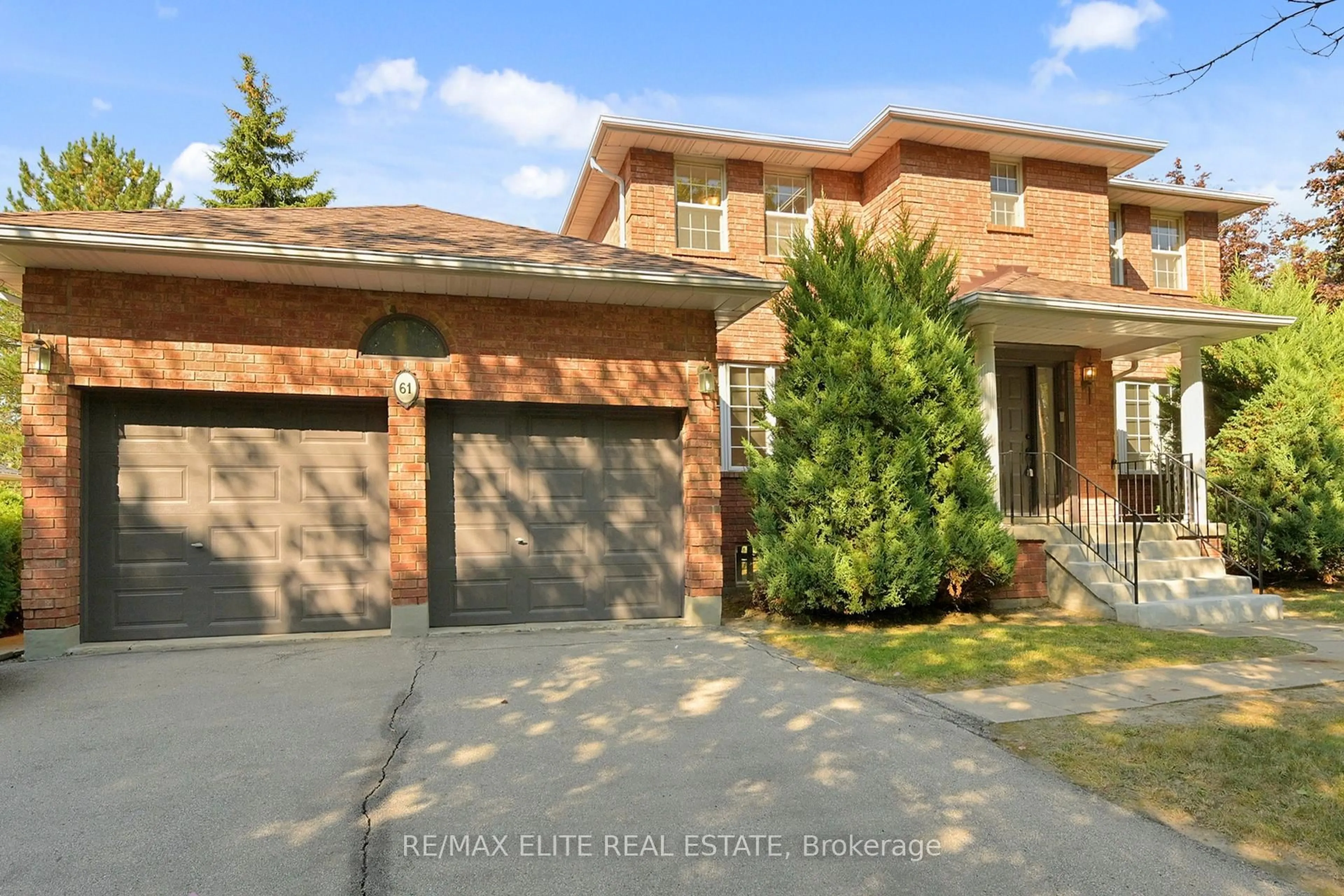 Home with brick exterior material, street for 61 Beaufort Hills Rd, Richmond Hill Ontario L4E 2N3