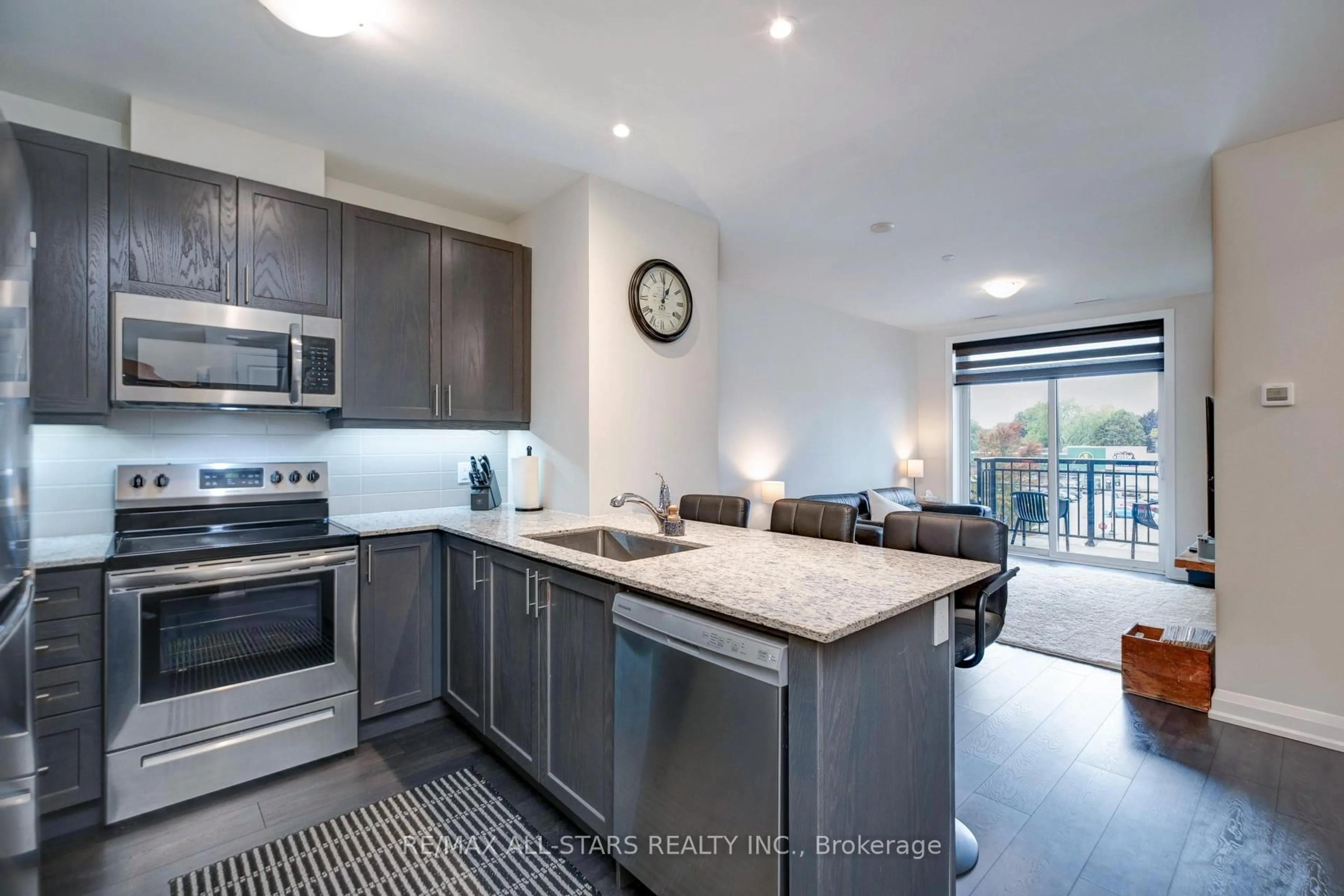 Open concept kitchen, ceramic/tile floor for 5917 Main St #309, Whitchurch-Stouffville Ontario L4A 5G4