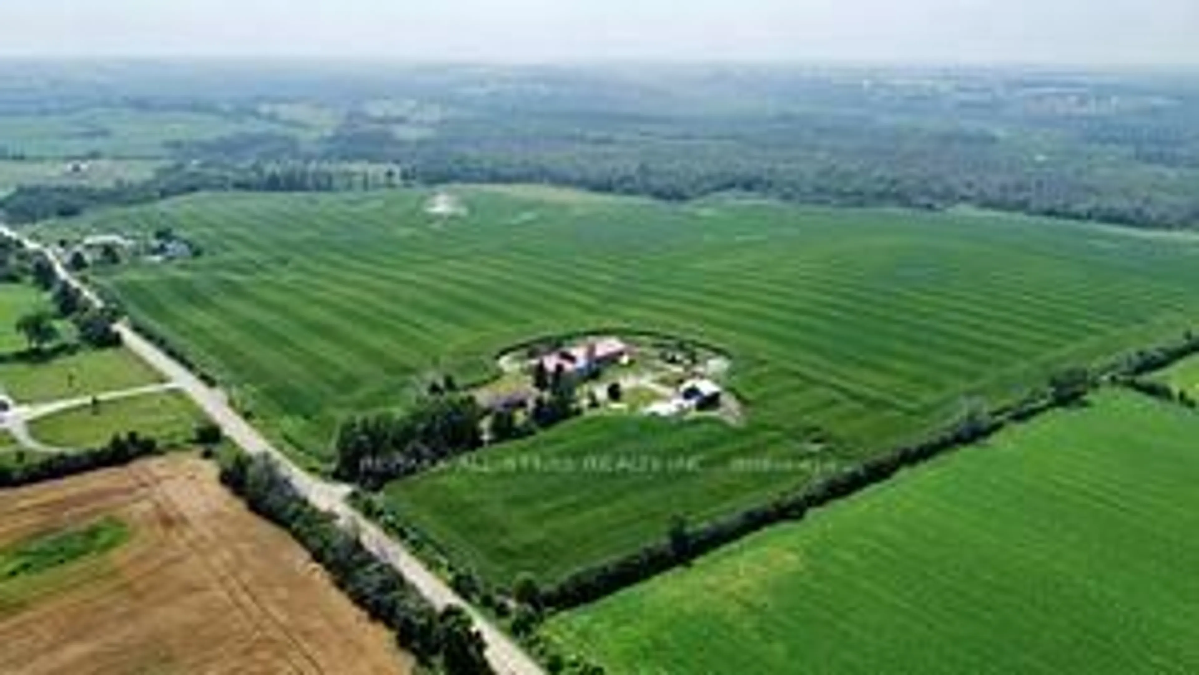 A pic from outside/outdoor area/front of a property/back of a property/a pic from drone, mountain view for 18500 18 Sdrd, Brock Ontario L0E 1E0