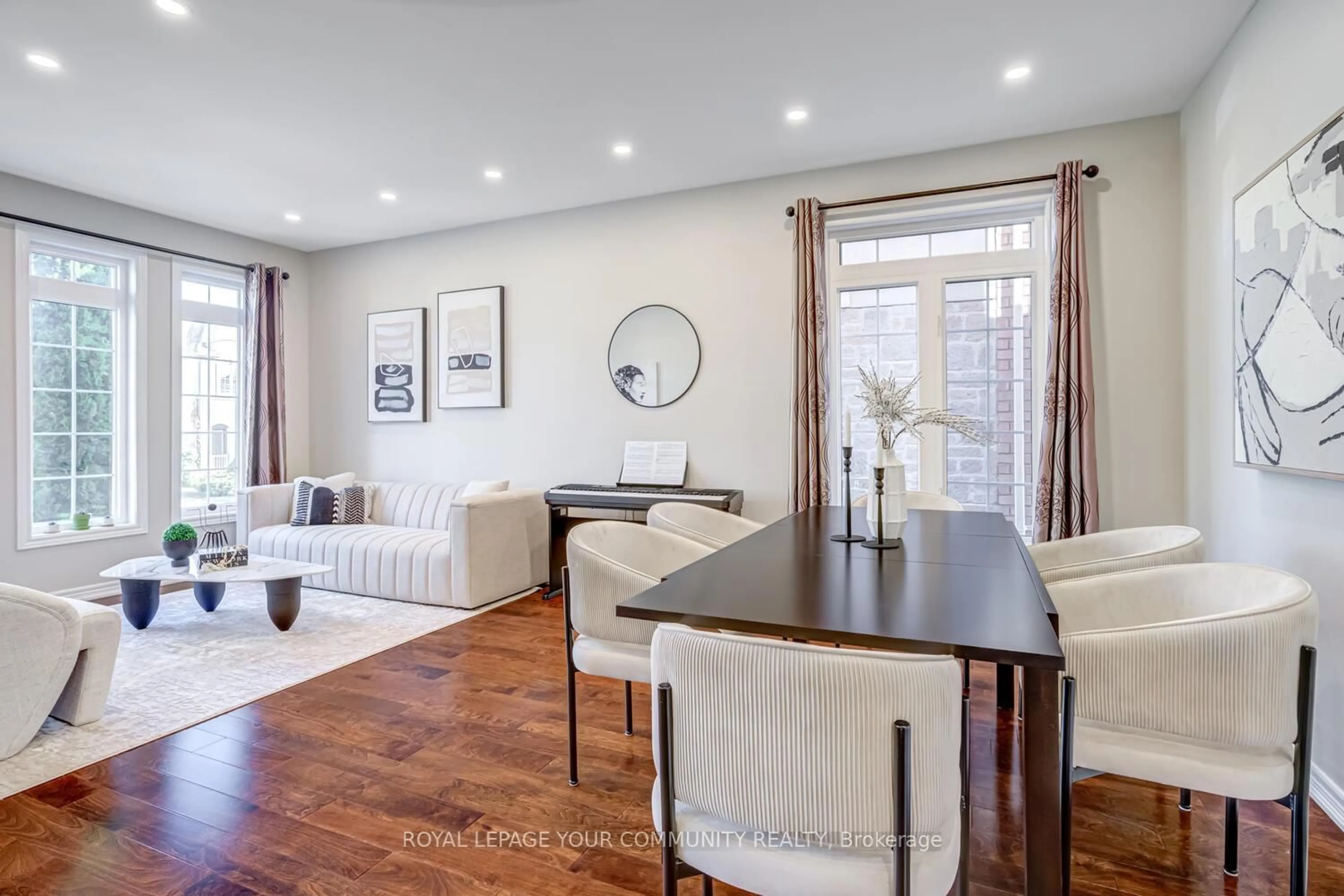 Living room with furniture, wood/laminate floor for 67 Cabernet Rd, Vaughan Ontario L4J 8X7