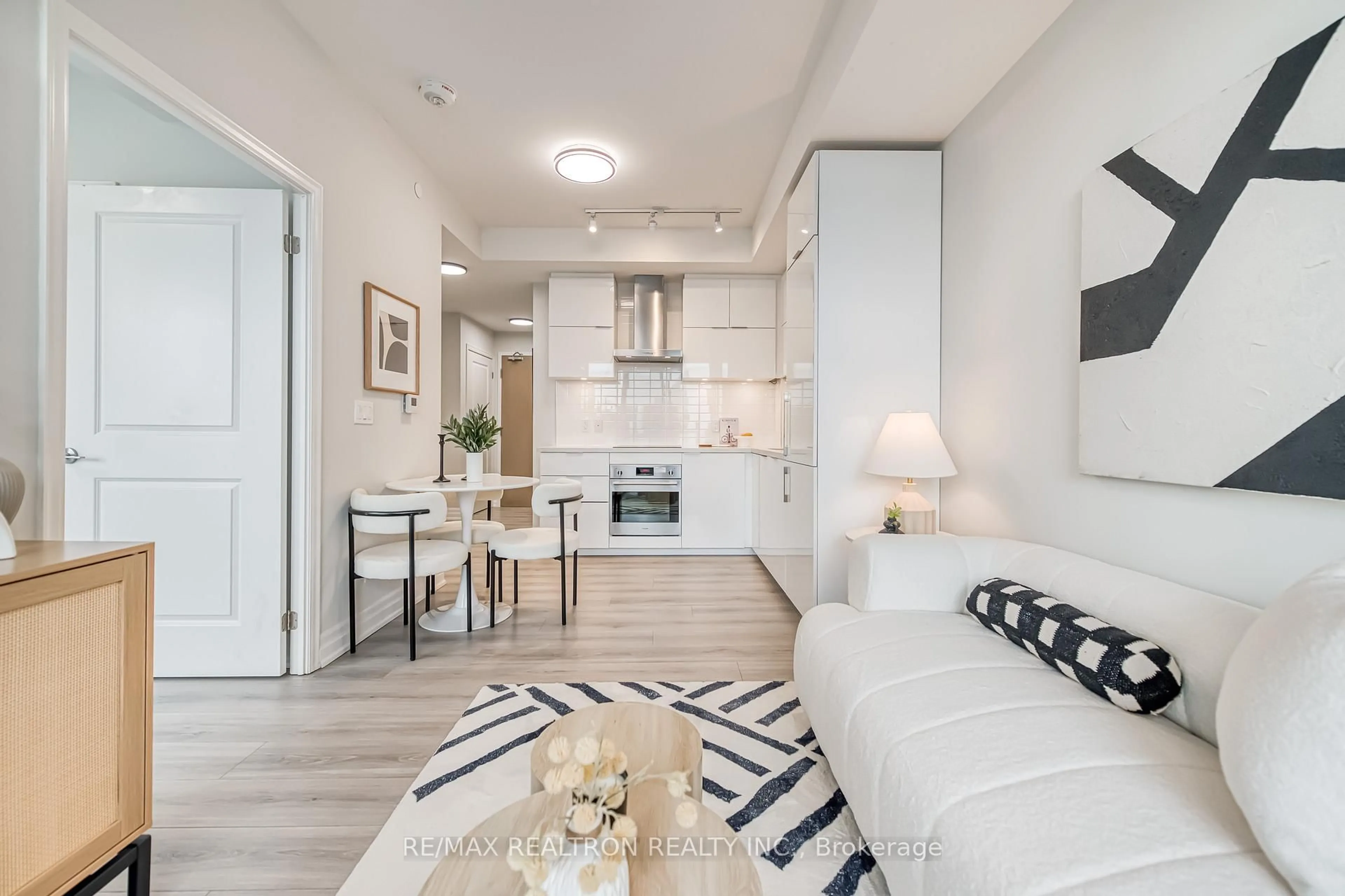 Living room with furniture, unknown for 8 Rouge Valley Dr #B716, Markham Ontario L6G 0G8
