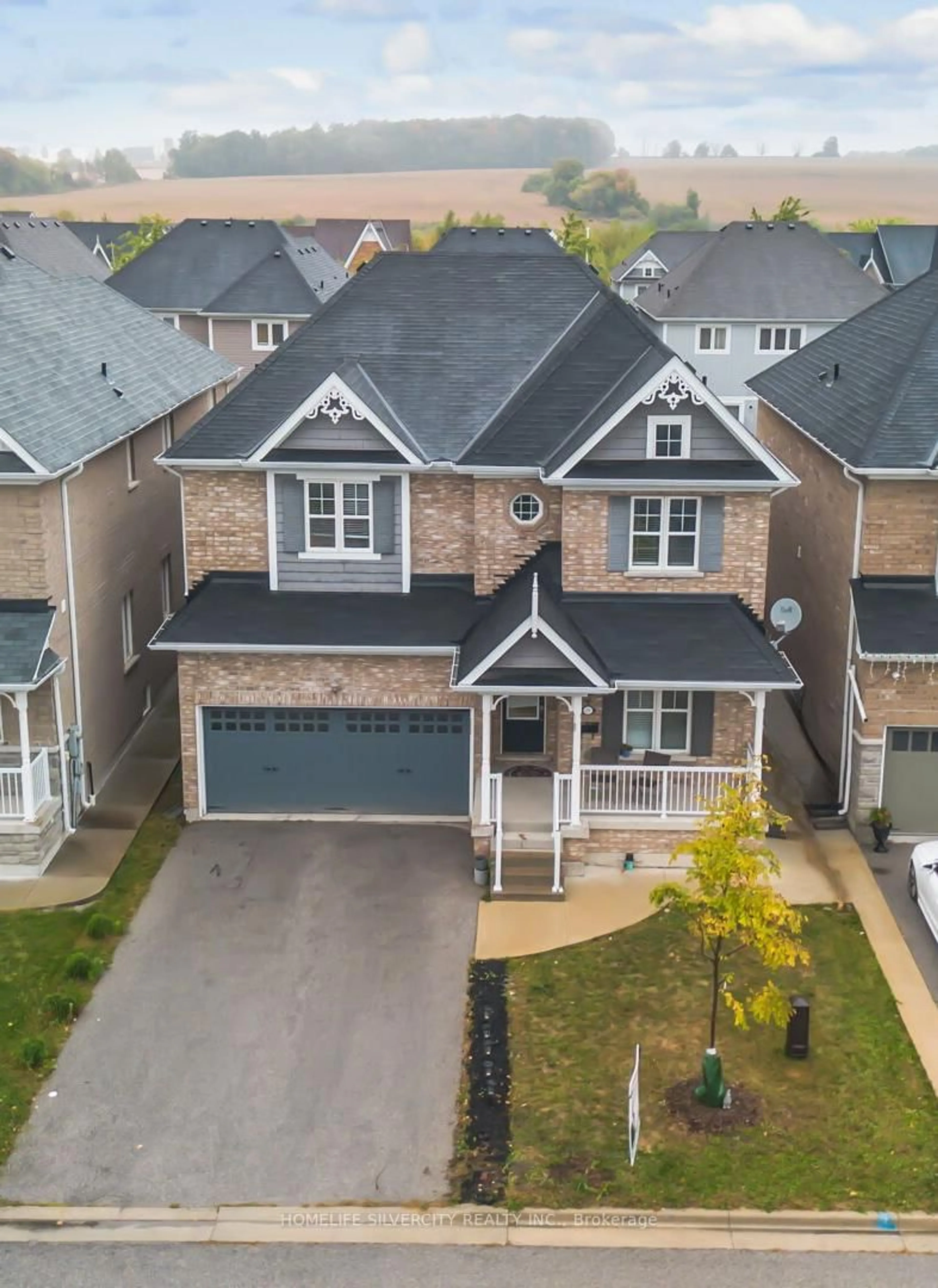 A pic from outside/outdoor area/front of a property/back of a property/a pic from drone, street for 28 Swenson St, New Tecumseth Ontario L9R 1V2
