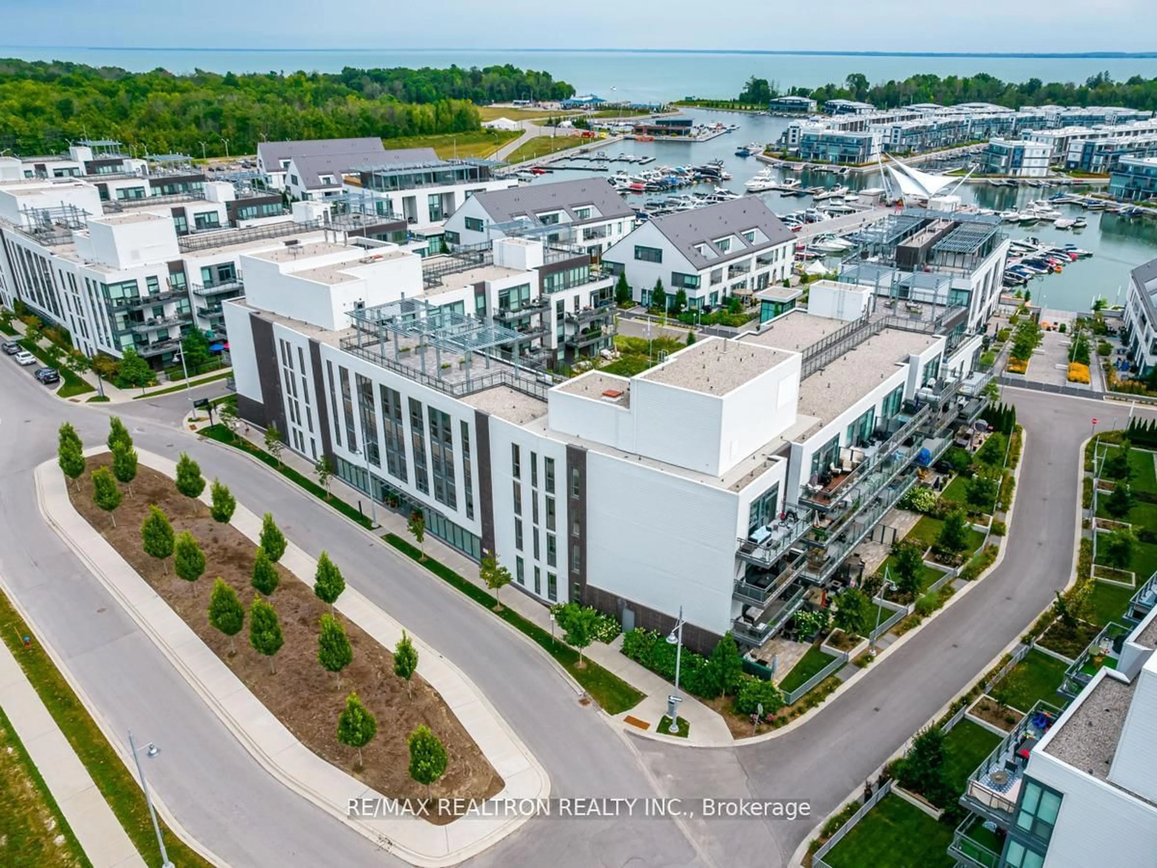A pic from outside/outdoor area/front of a property/back of a property/a pic from drone, unknown for 301 Sea Ray Ave #C216, Innisfil Ontario L9S 0M3
