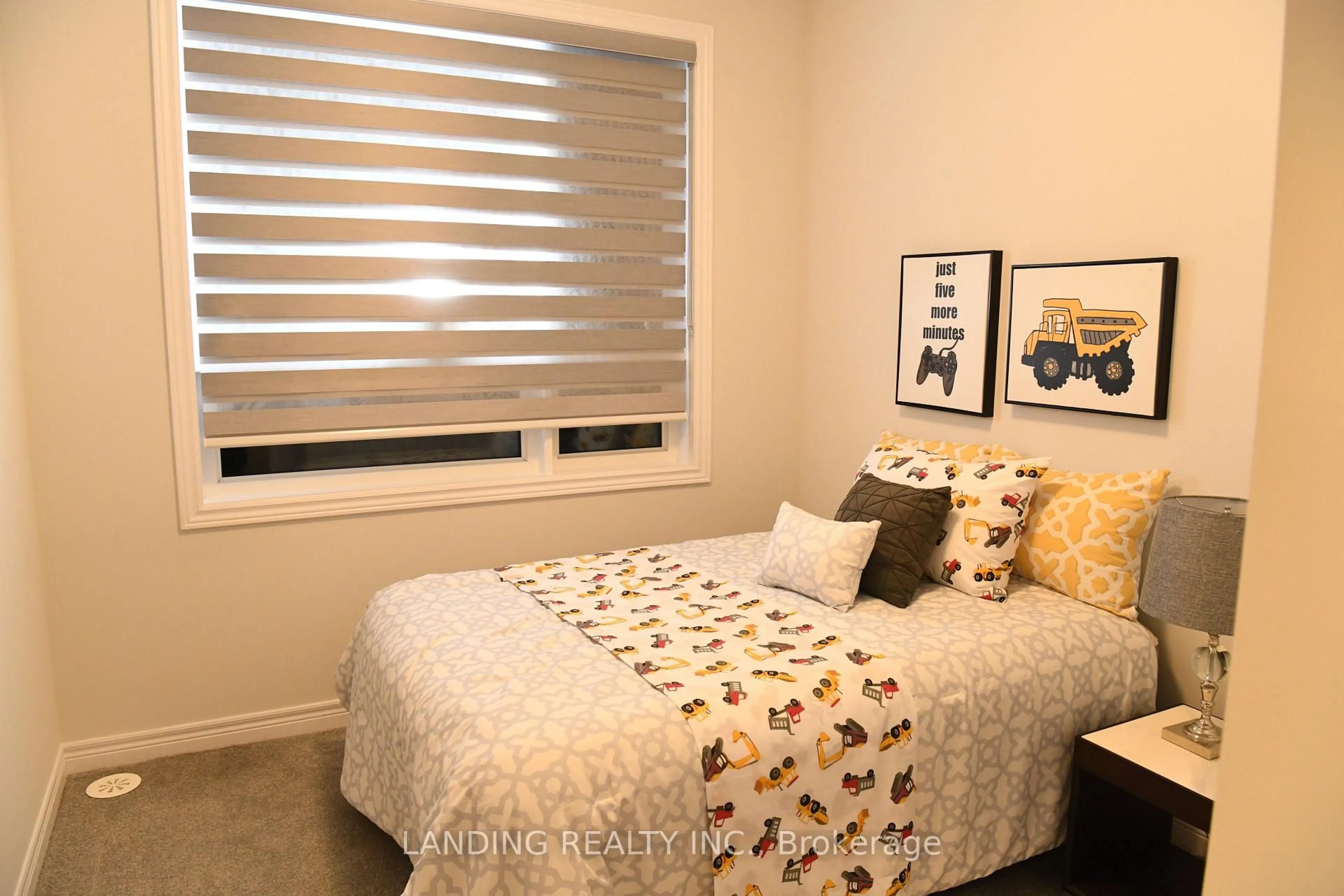 Bedroom with bed, wood/laminate floor for 112 Robert Eaton Ave, Markham Ontario L3S 0G1