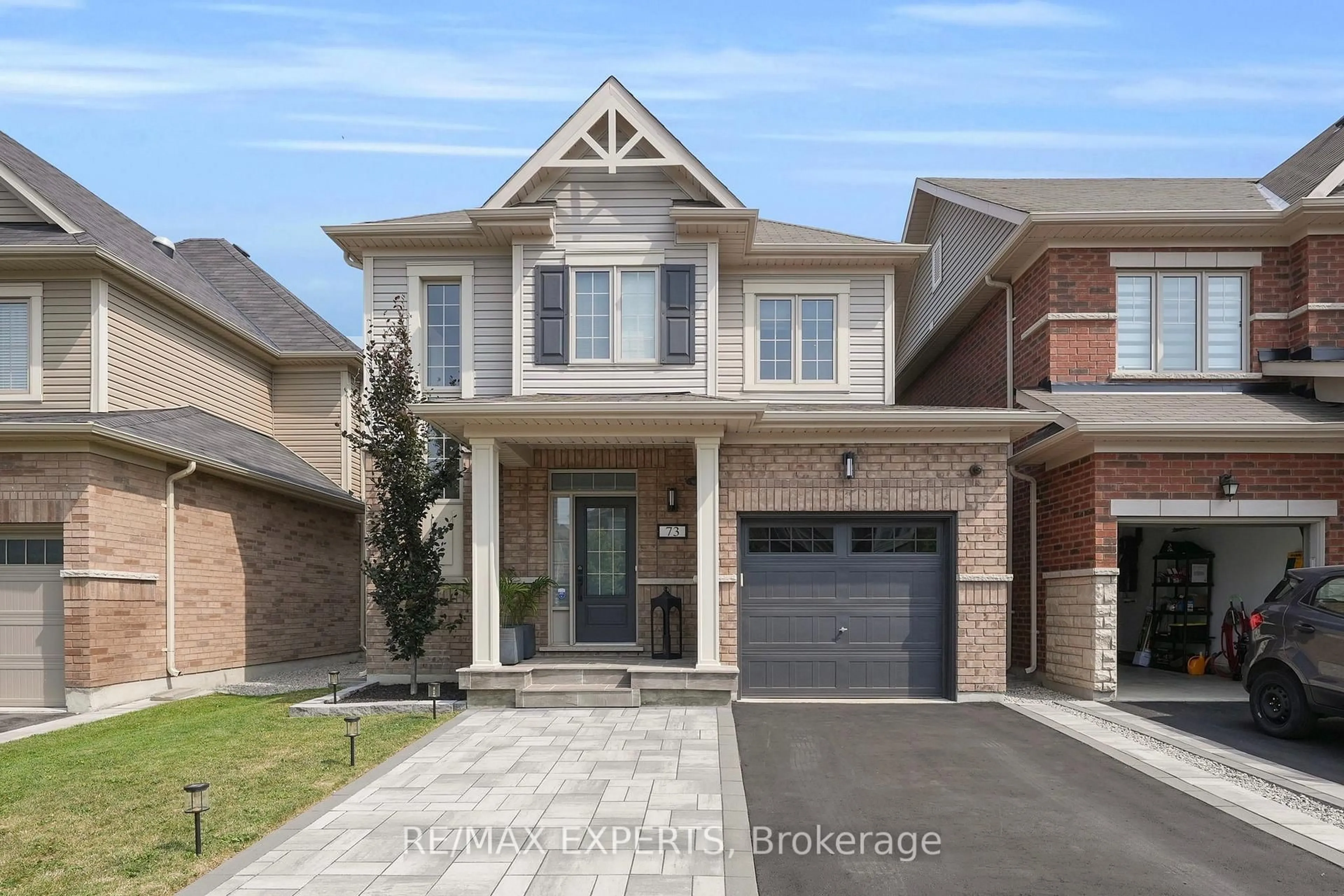 Home with brick exterior material, street for 73 Donnan Dr, New Tecumseth Ontario L0G 1W0