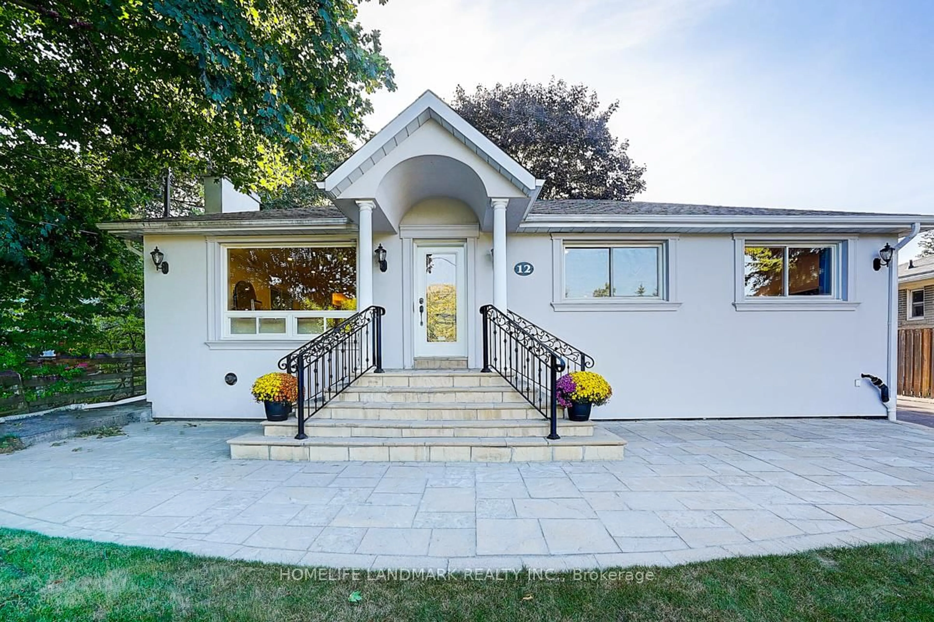 Home with vinyl exterior material, street for 12 Paramount Rd, Markham Ontario L3P 2V7