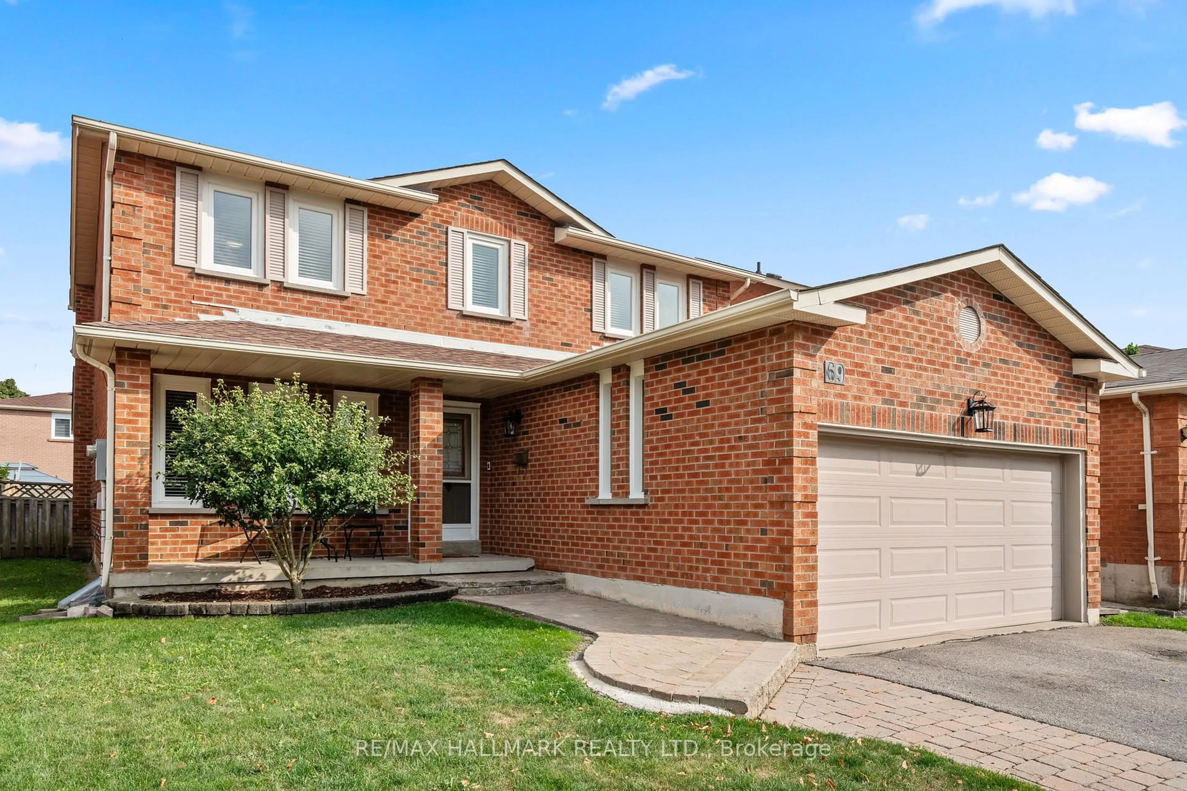 Home with brick exterior material, street for 69 Cairns Dr, Markham Ontario L3P 6J3