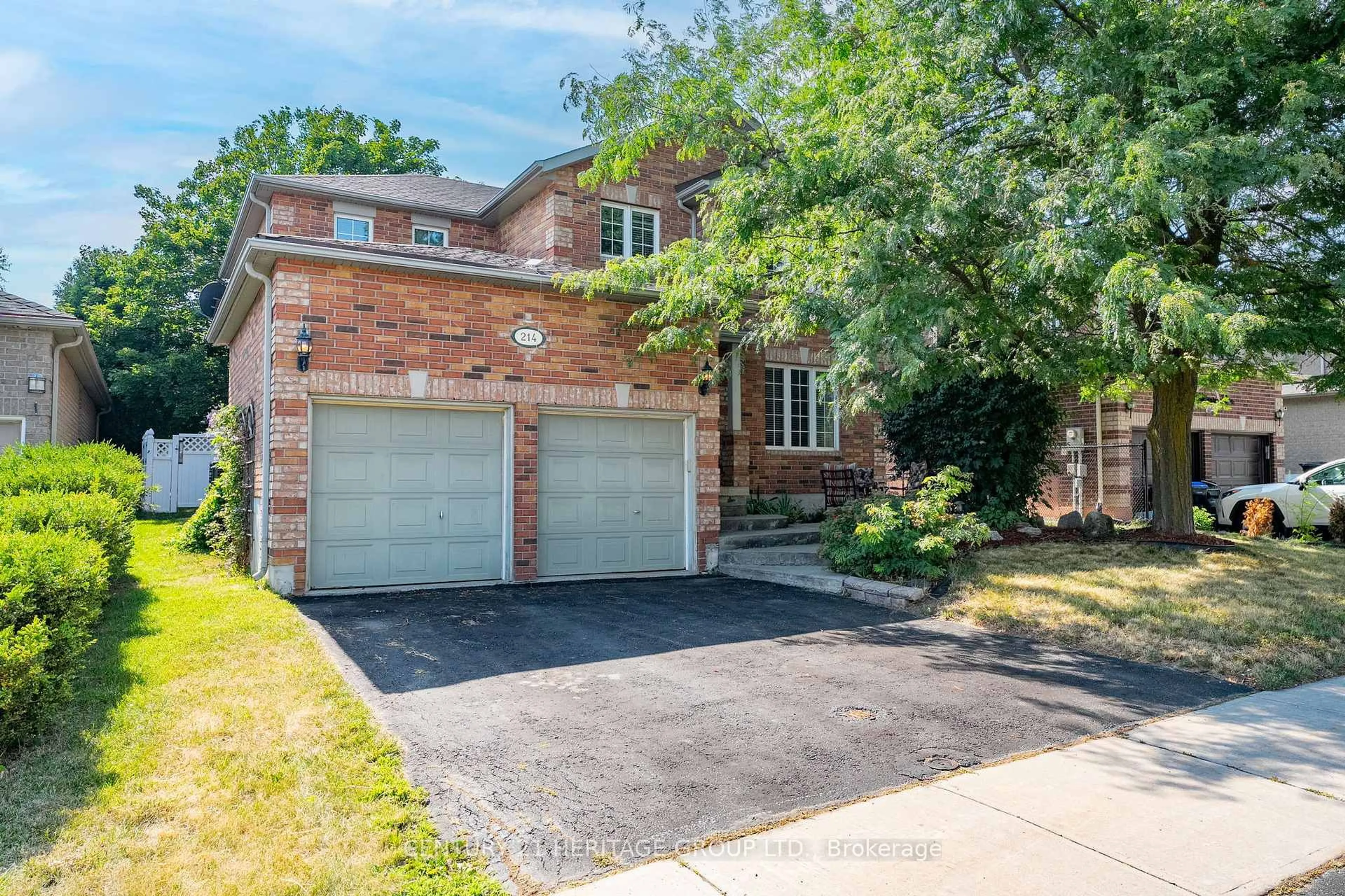 Home with brick exterior material, street for 214 Melbourne Dr, Bradford West Gwillimbury Ontario L3Z 2Y8