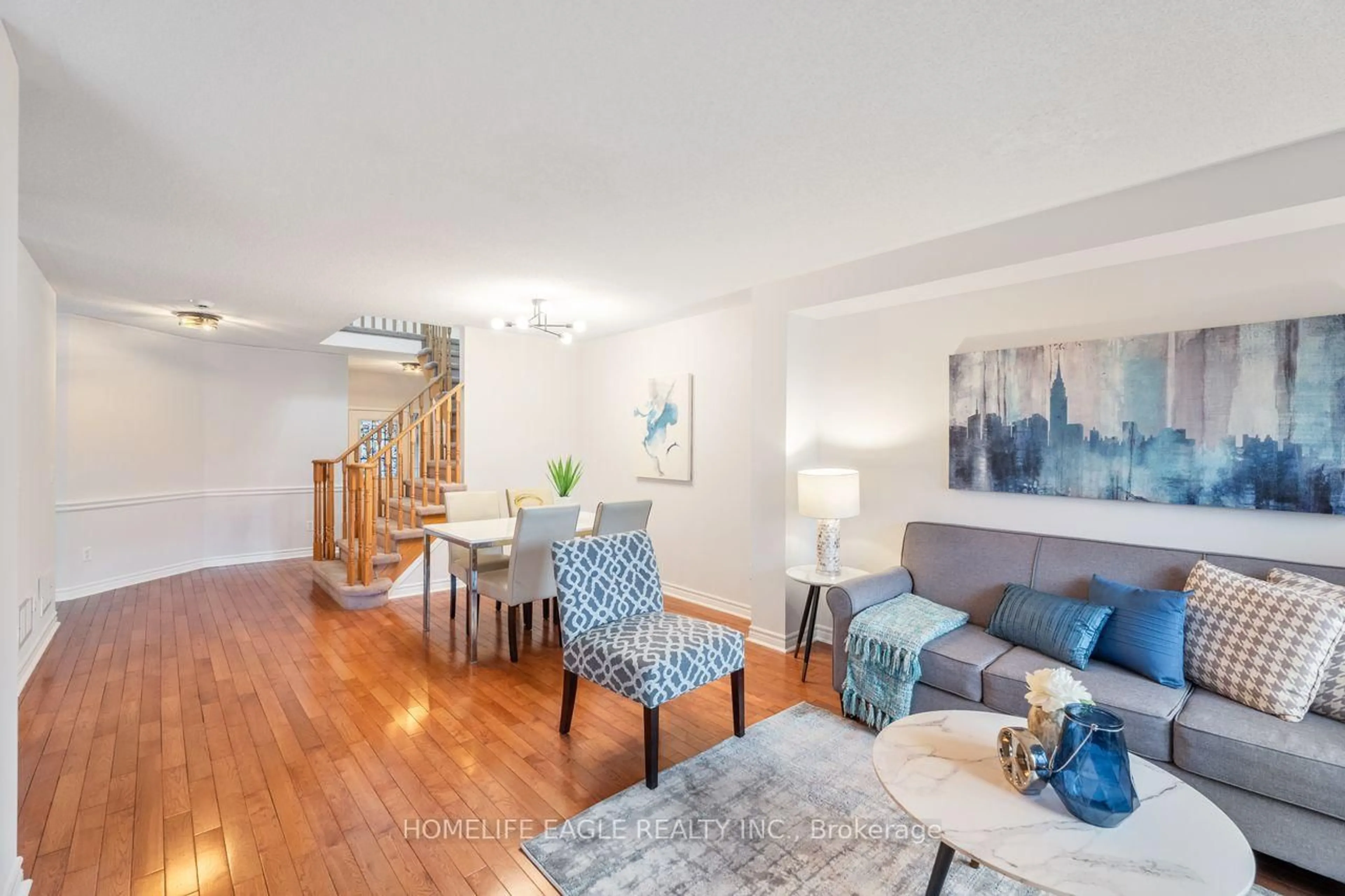 Living room with furniture, wood/laminate floor for 42 Millcliff Circ, Aurora Ontario L4G 7N7