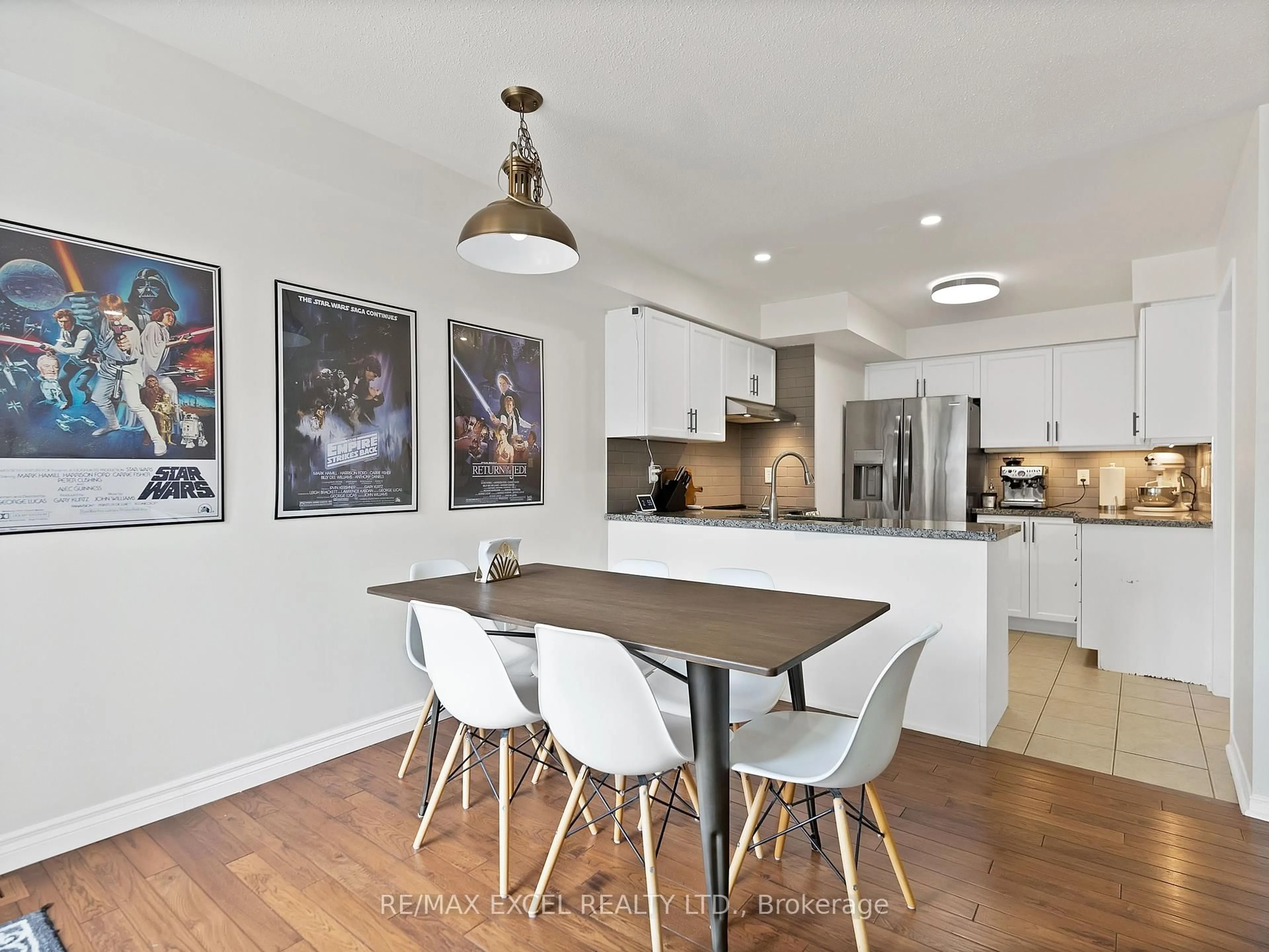 Open concept kitchen, wood/laminate floor for 26 Lilly Mckeowan Cres, East Gwillimbury Ontario L0G 1M0