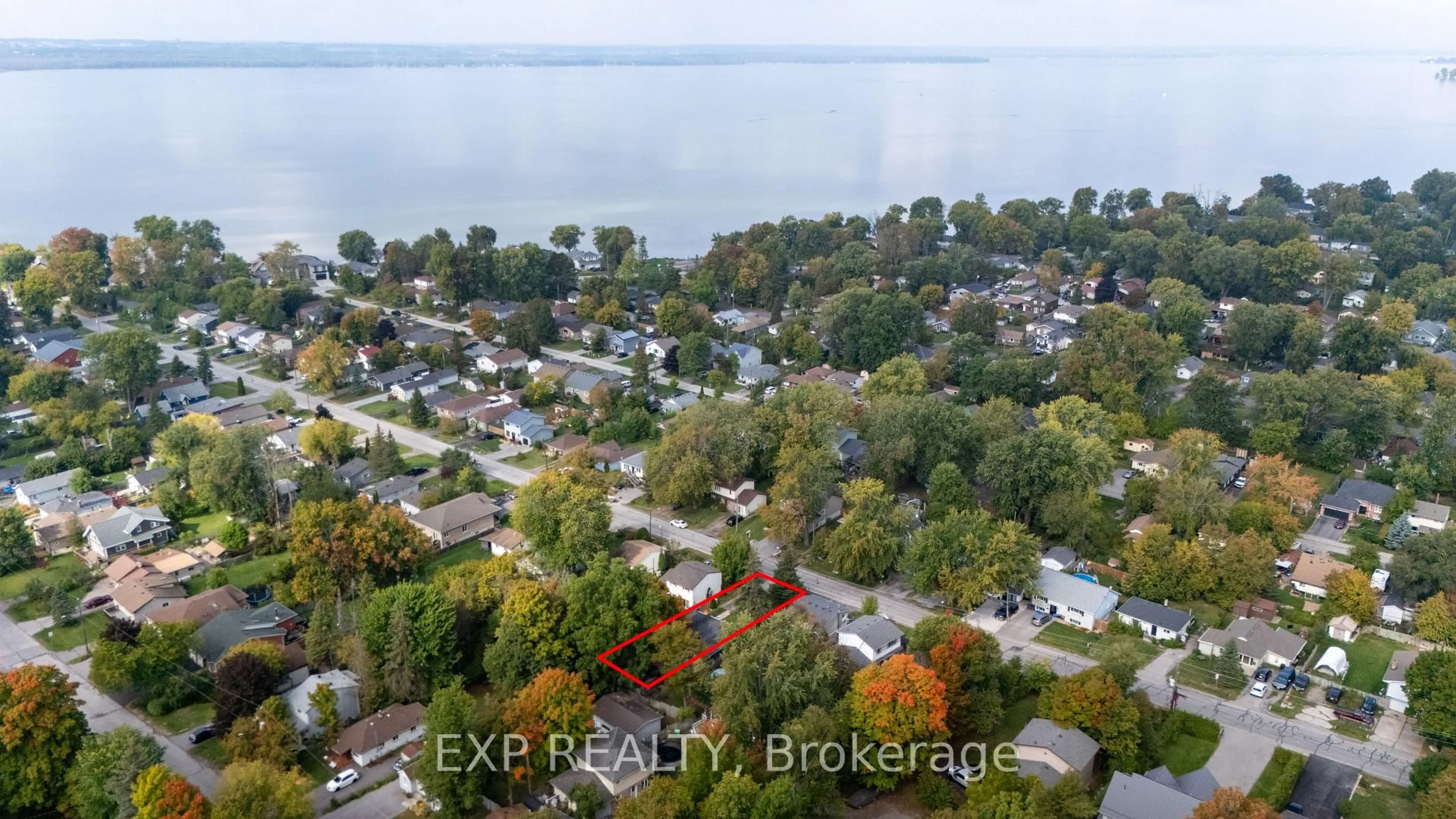 A pic from outside/outdoor area/front of a property/back of a property/a pic from drone, water/lake/river/ocean view for 261 Glenwoods Ave, Georgina Ontario L4P 2X1