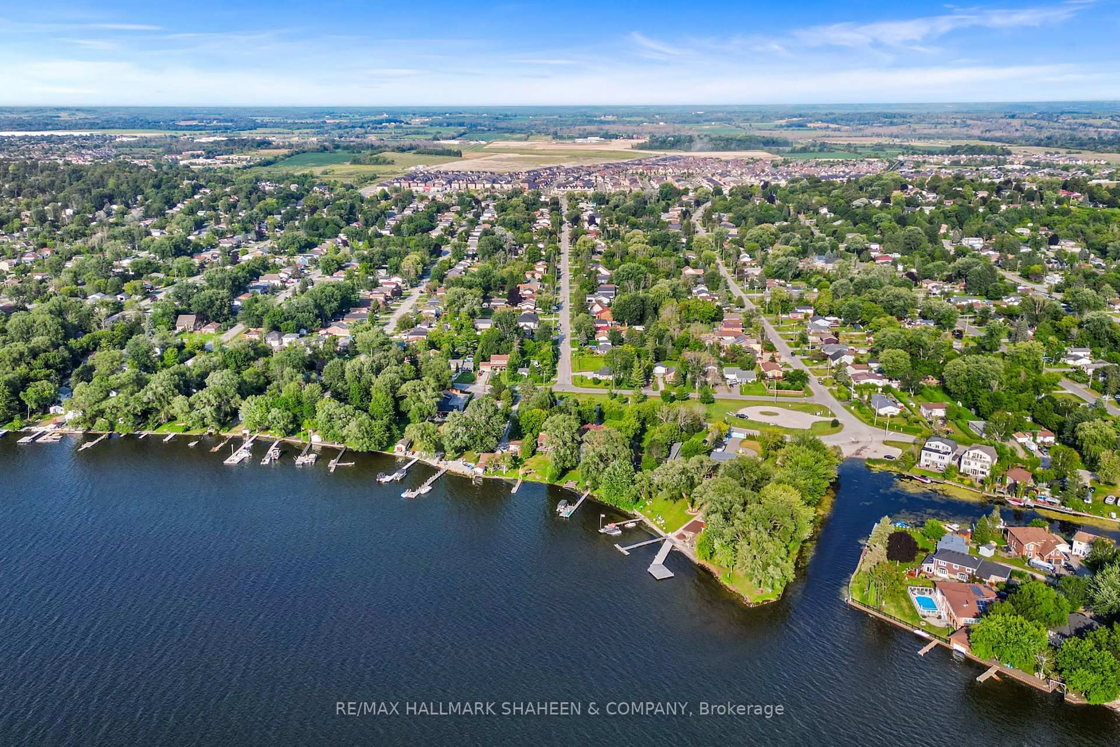 A pic from outside/outdoor area/front of a property/back of a property/a pic from drone, water/lake/river/ocean view for 312 Terrace Dr, Georgina Ontario L4P 2Y8