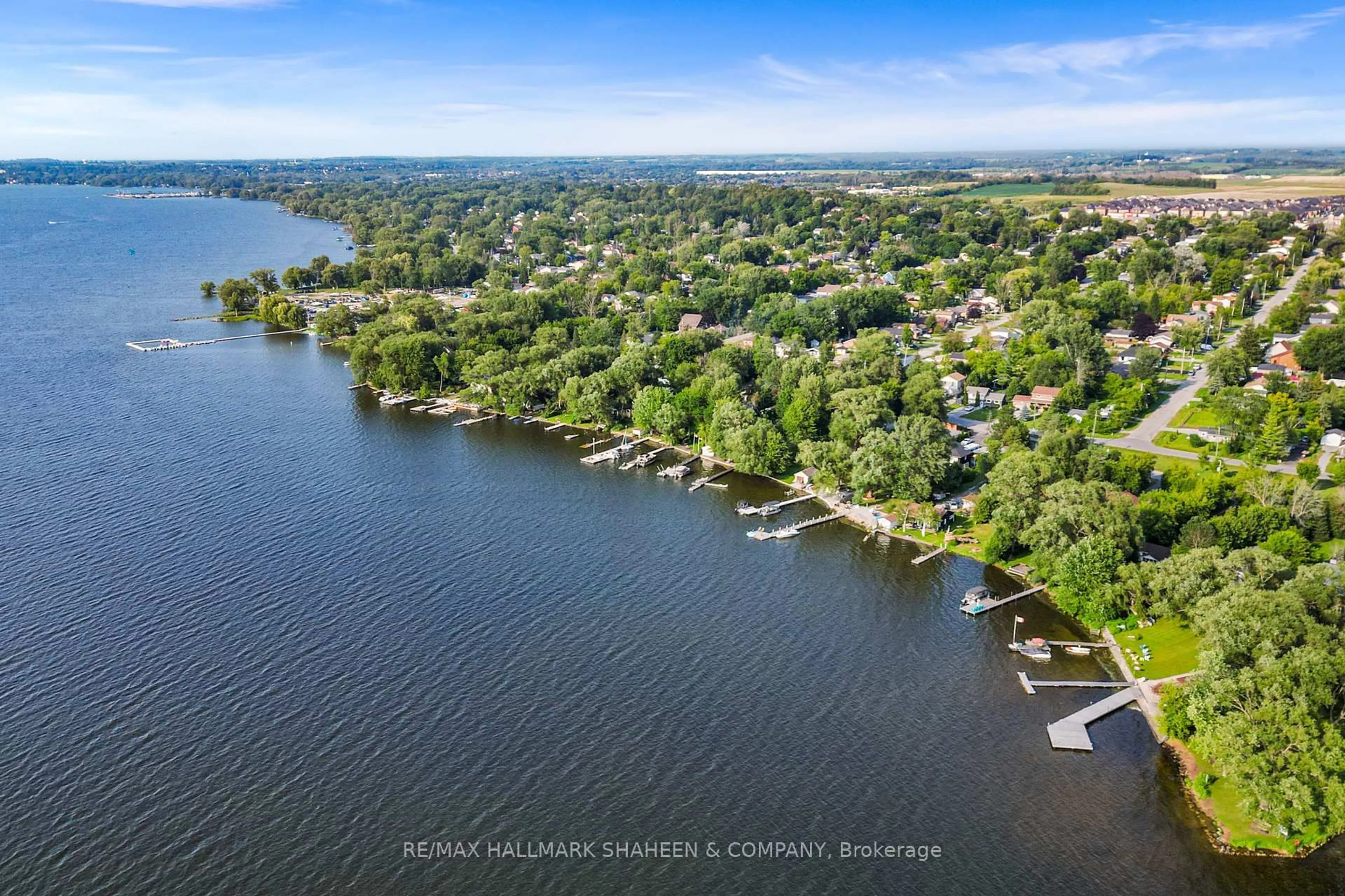 A pic from outside/outdoor area/front of a property/back of a property/a pic from drone, water/lake/river/ocean view for 312 Terrace Dr, Georgina Ontario L4P 2Y8