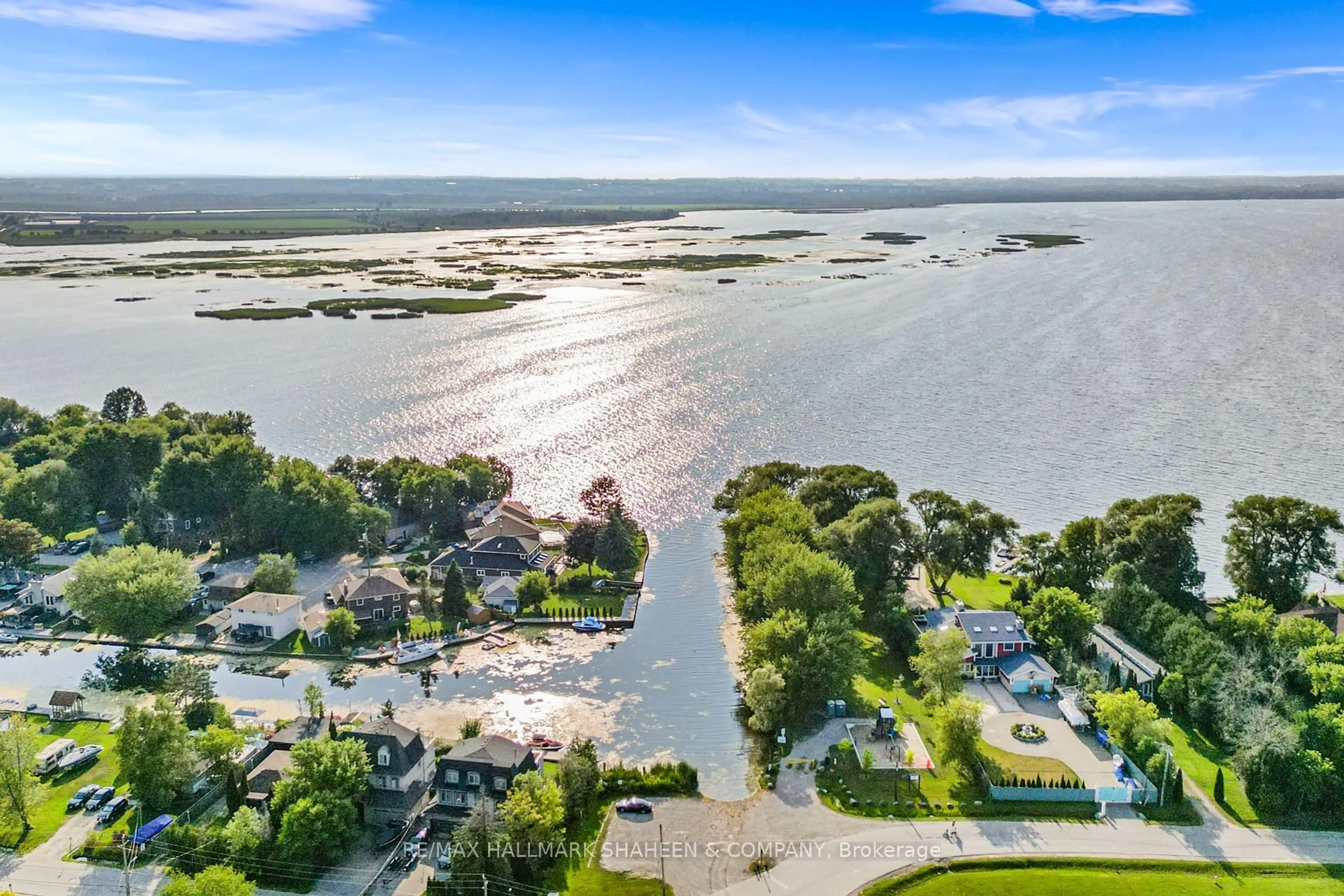 A pic from outside/outdoor area/front of a property/back of a property/a pic from drone, water/lake/river/ocean view for 312 Terrace Dr, Georgina Ontario L4P 2Y8