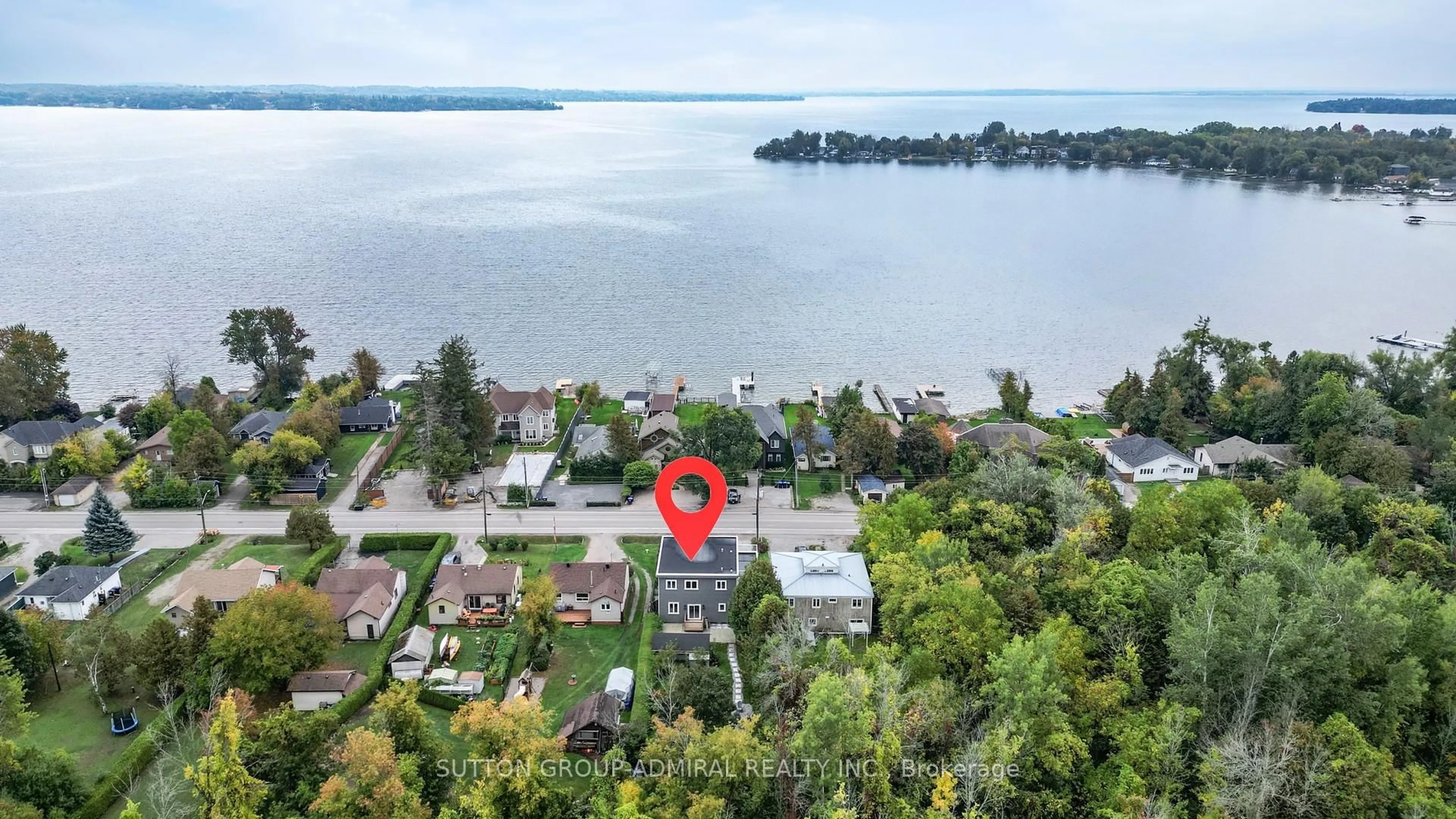 A pic from outside/outdoor area/front of a property/back of a property/a pic from drone, water/lake/river/ocean view for 1372 Maple Rd, Innisfil Ontario L0L 1C0