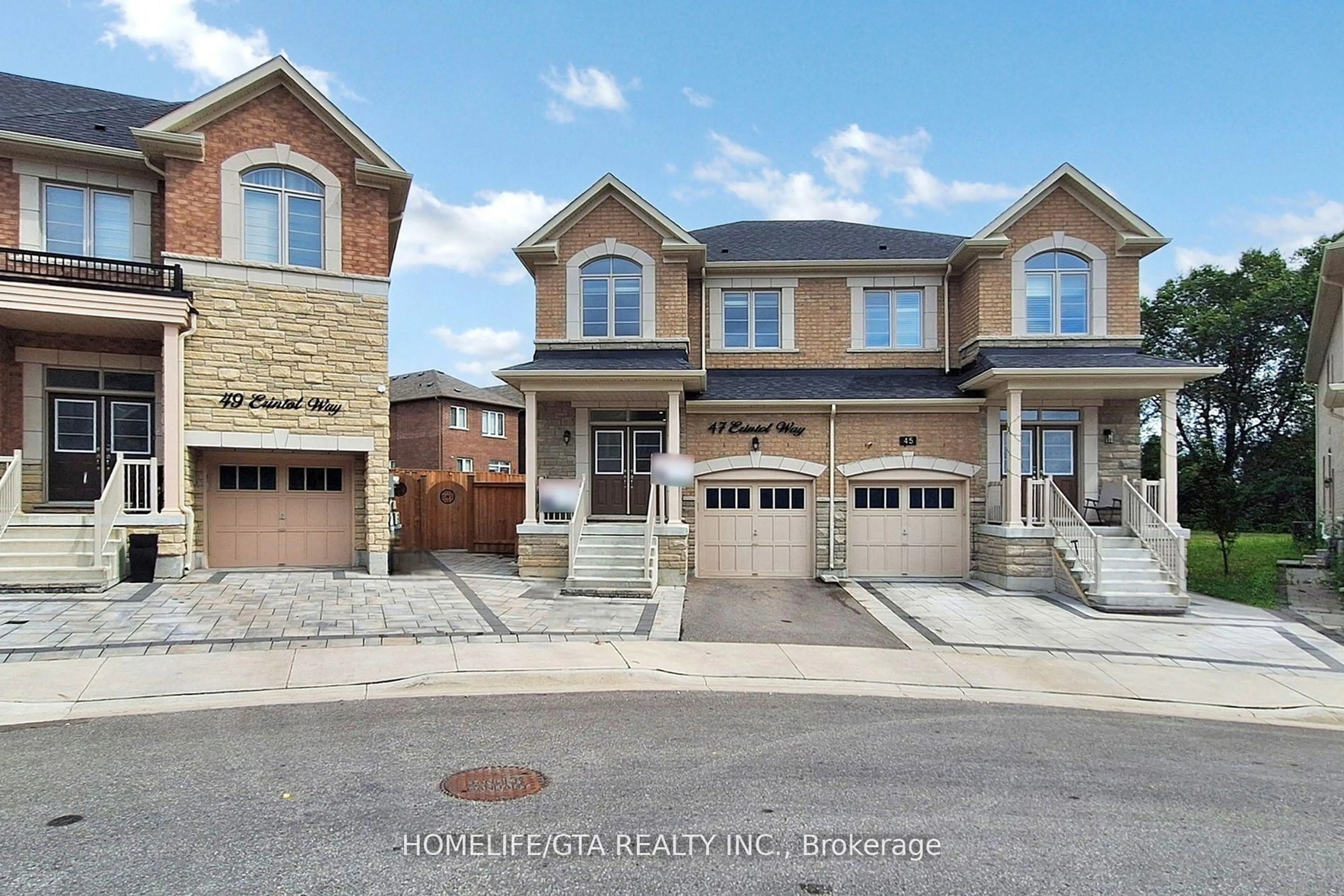 Home with brick exterior material, street for 47 Erintol Way, Markham Ontario L3S 0E6