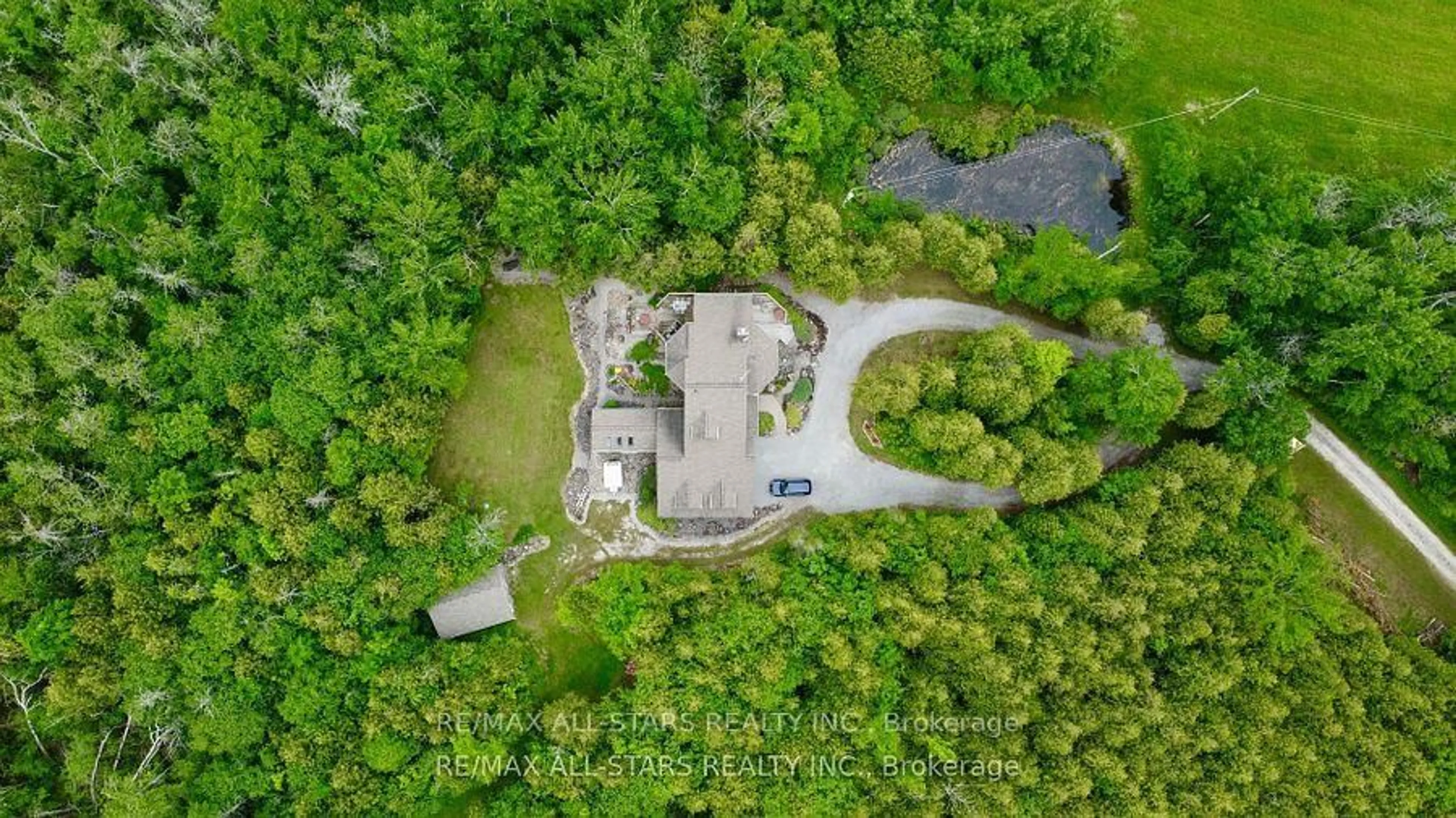 A pic from outside/outdoor area/front of a property/back of a property/a pic from drone, unknown for 27352 Highway 48, Georgina Ontario L0E 1R0