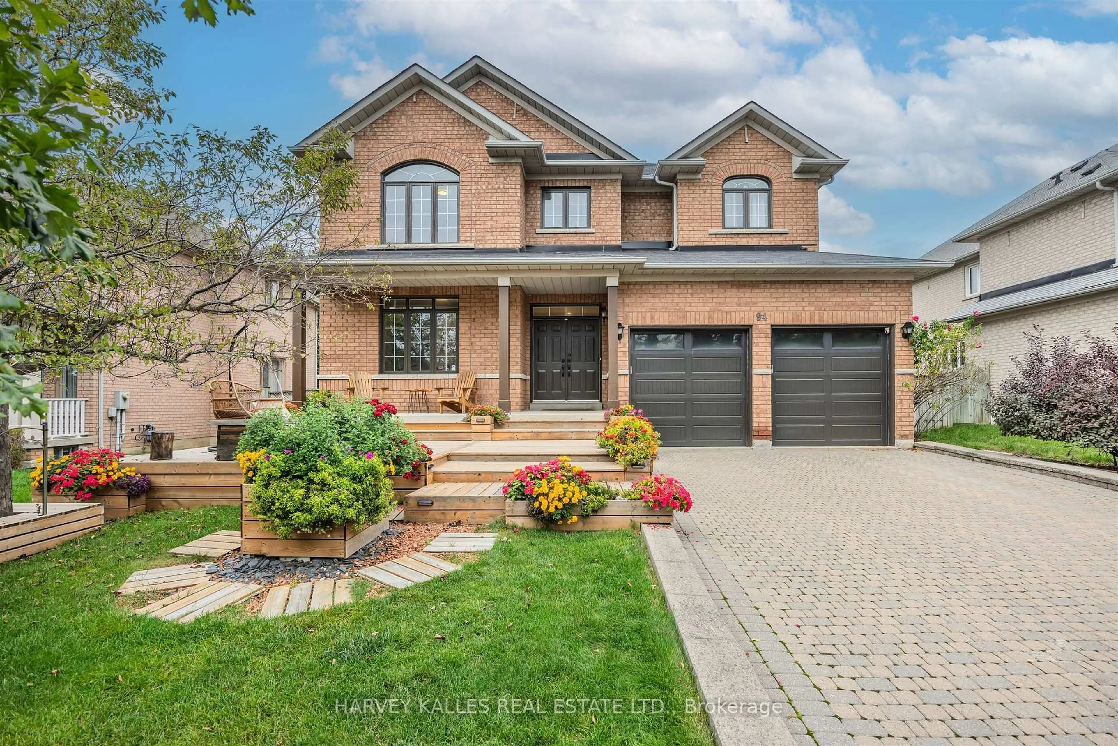Home with brick exterior material, street for 94 Sutcliffe Cres, Markham Ontario L6C 1X3