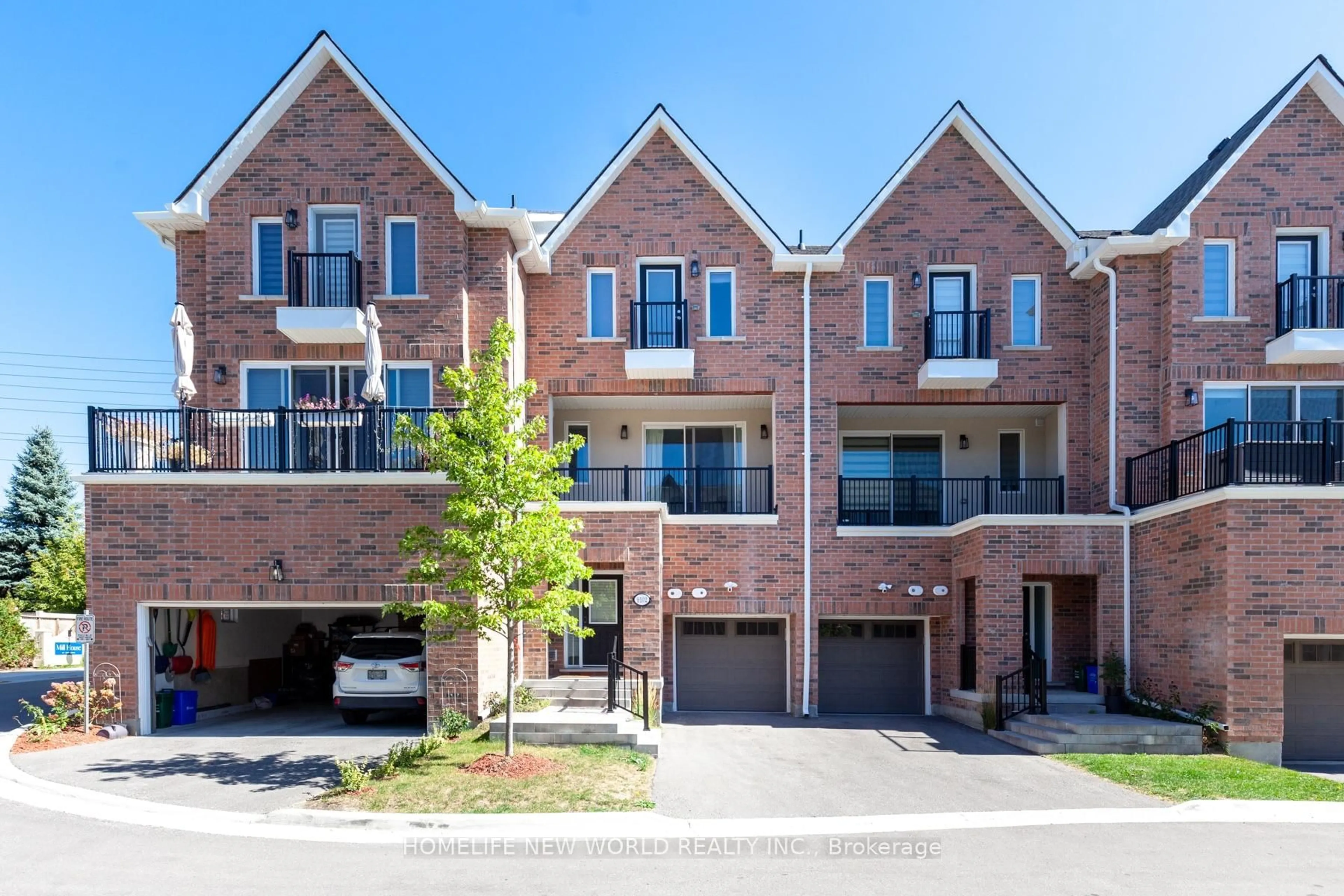 Home with brick exterior material, street for 9102 woodbine Ave, Markham Ontario L3R 0J8