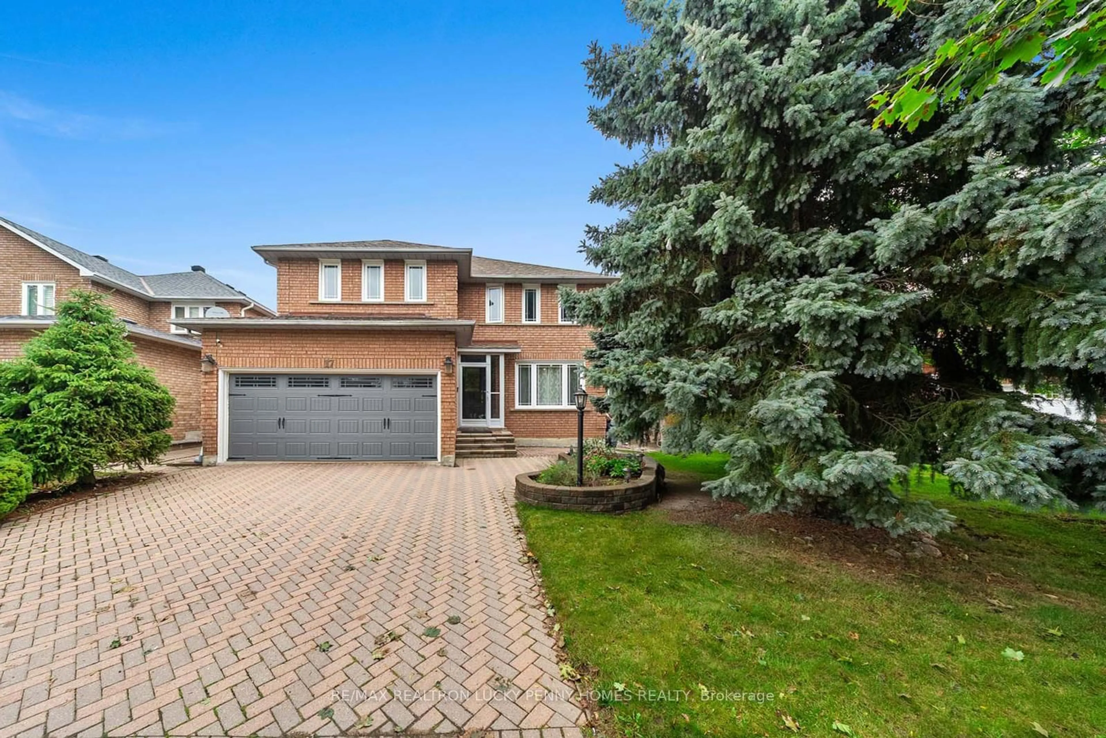Home with brick exterior material, street for 17 Buttonfield Rd, Markham Ontario L3R 9G1