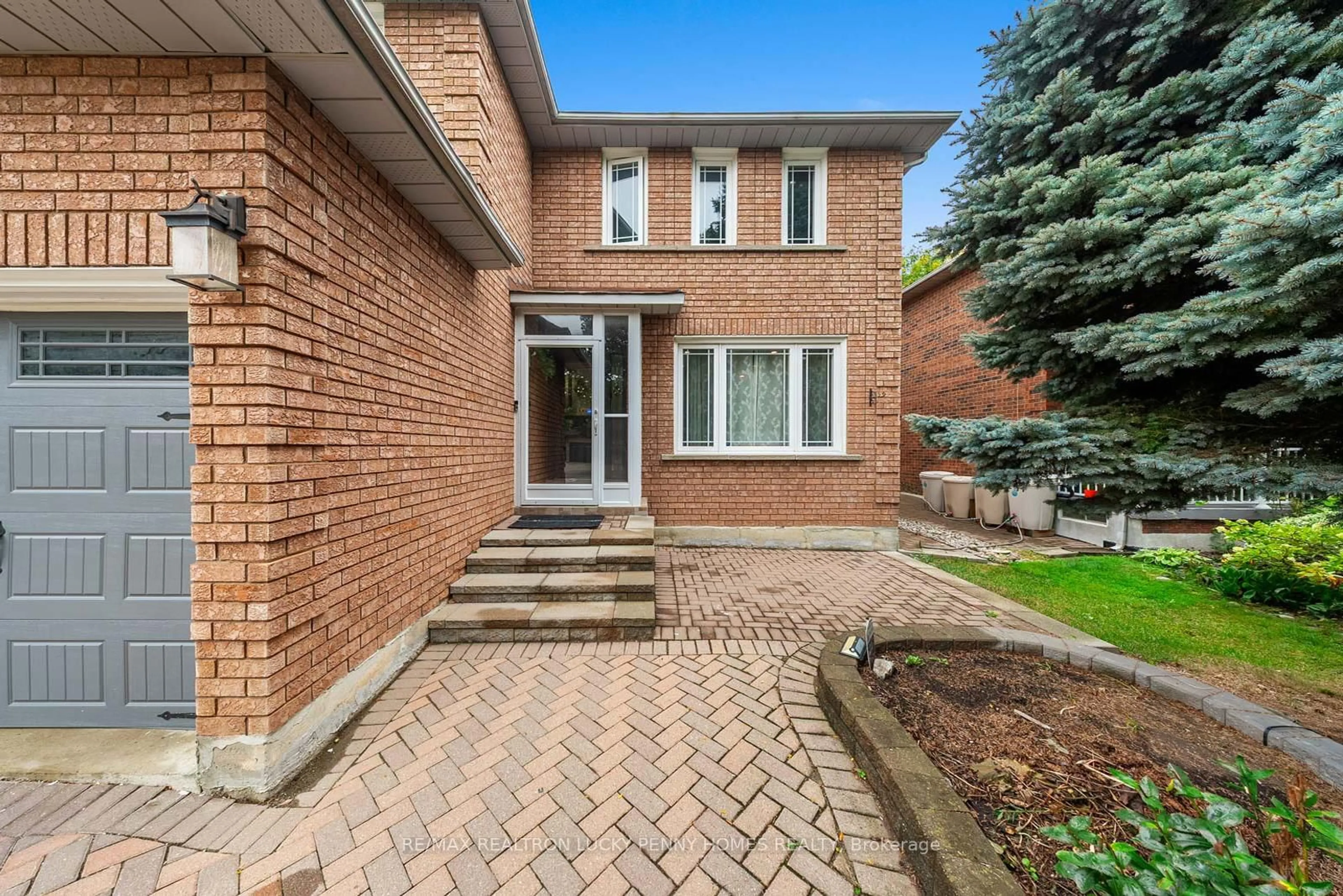 Home with brick exterior material, street for 17 Buttonfield Rd, Markham Ontario L3R 9G1