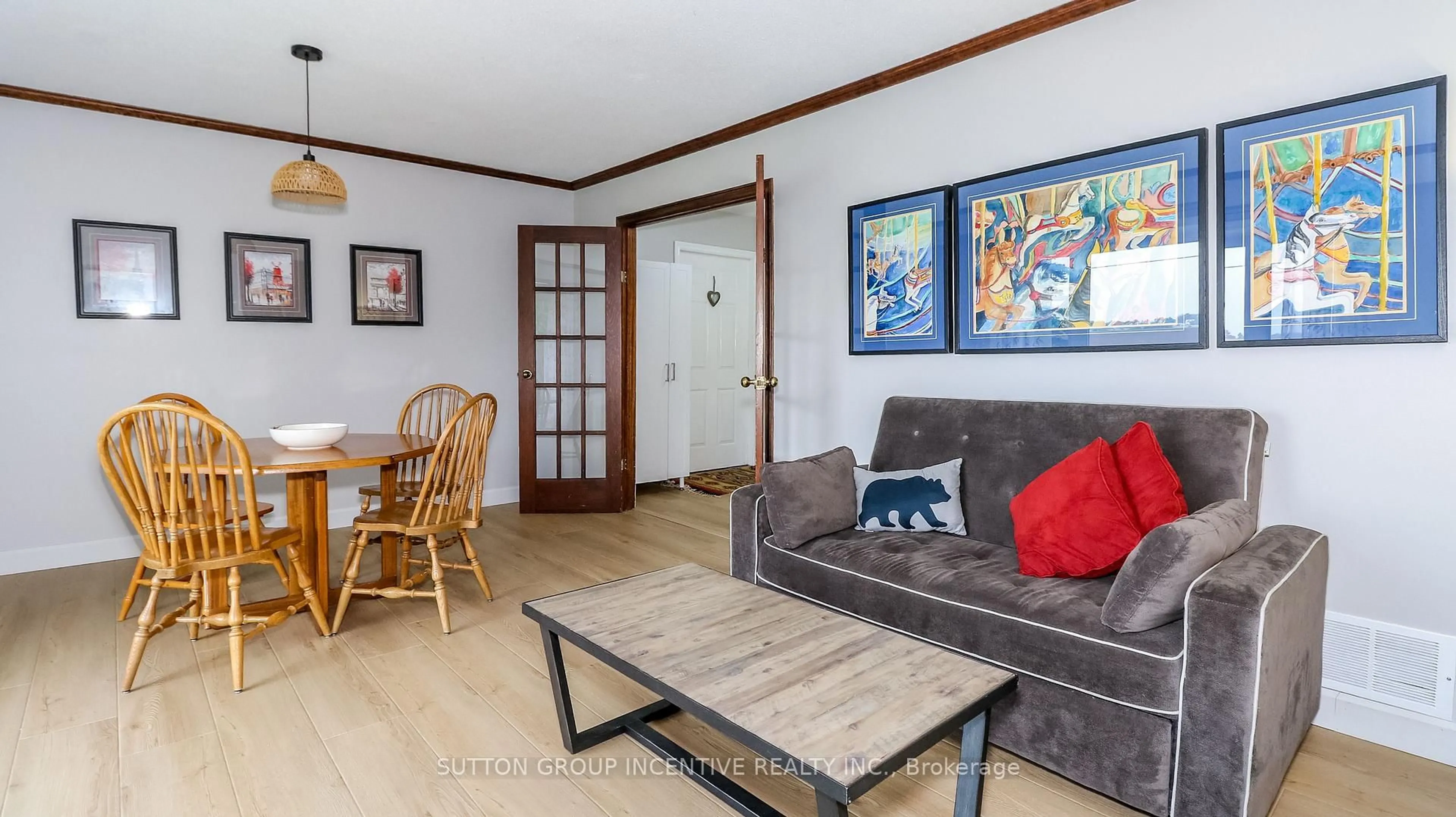 Living room with furniture, wood/laminate floor for 2717 Line 13 Line, Bradford West Gwillimbury Ontario L0L 1R0
