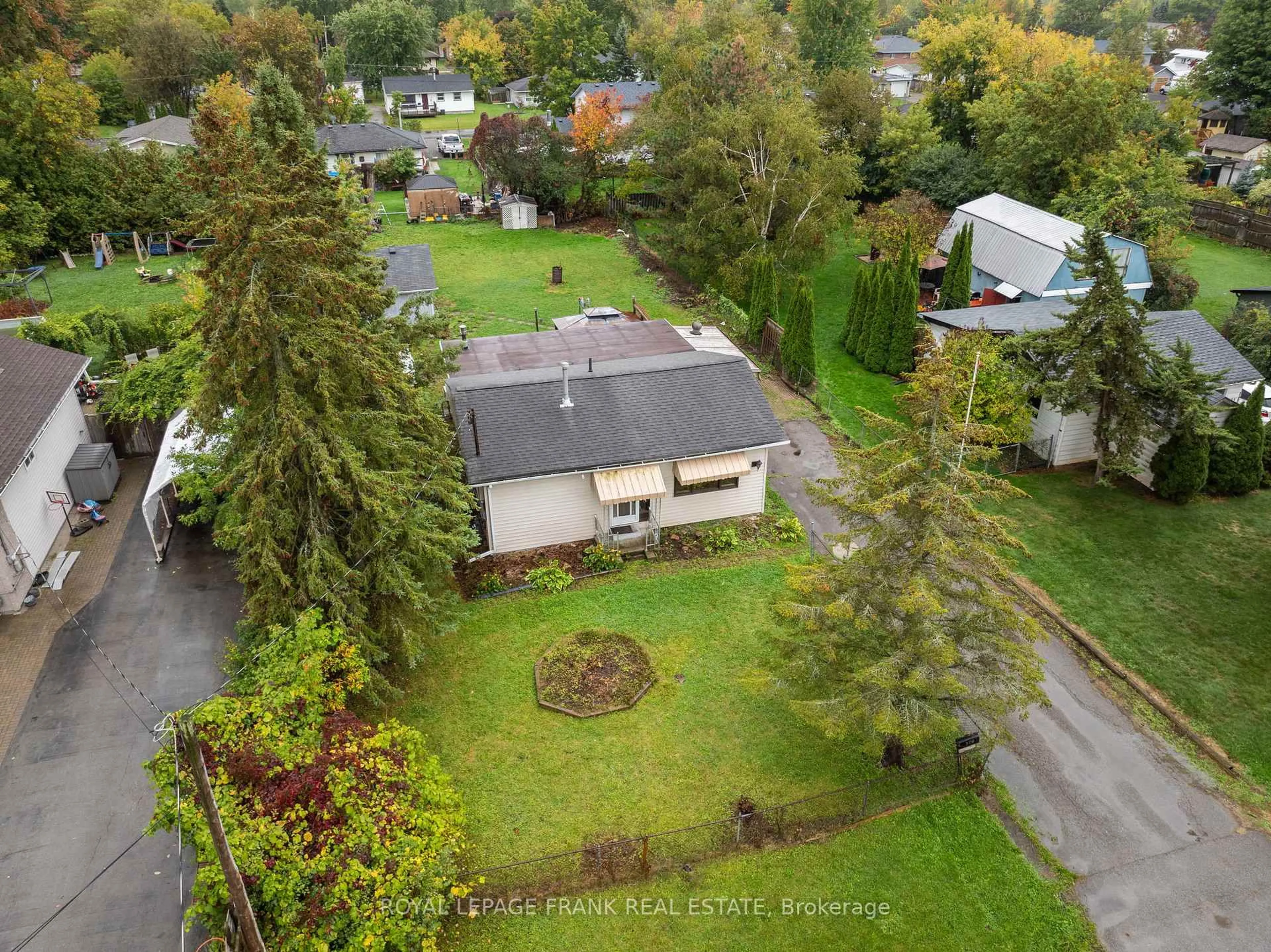 A pic from outside/outdoor area/front of a property/back of a property/a pic from drone, street for 379 Irene Dr, Georgina Ontario L4P 3B3