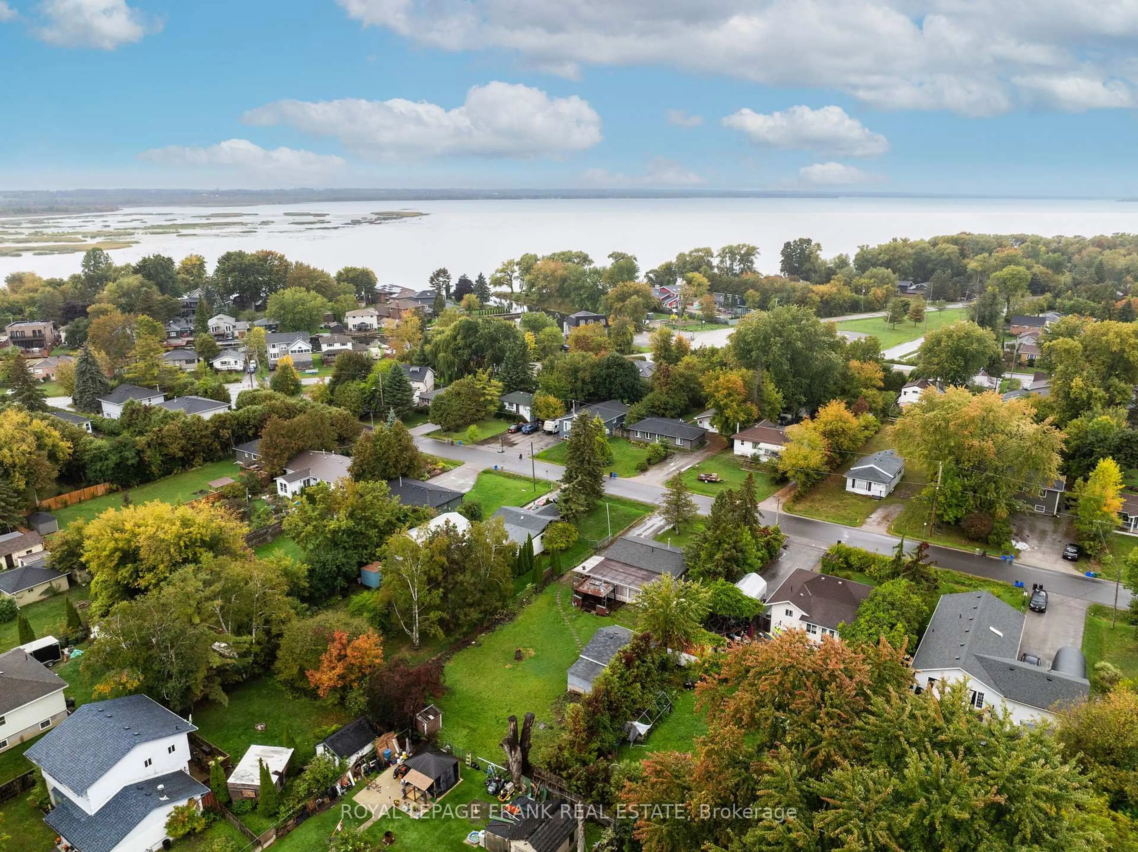 A pic from outside/outdoor area/front of a property/back of a property/a pic from drone, water/lake/river/ocean view for 379 Irene Dr, Georgina Ontario L4P 3B3