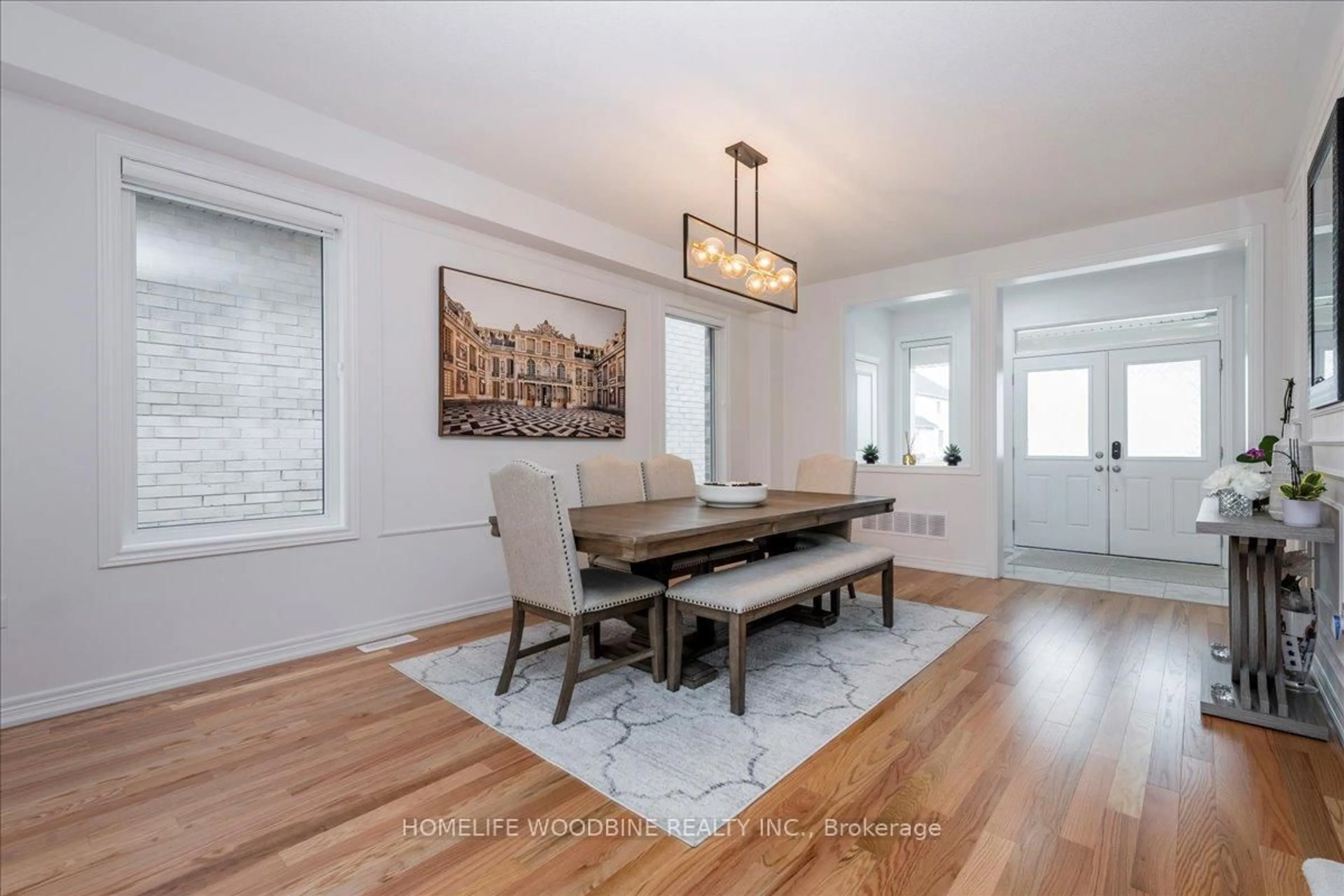 Dining room, wood/laminate floor for 21 Wakefield Blvd, Essa Ontario L3W 0L7
