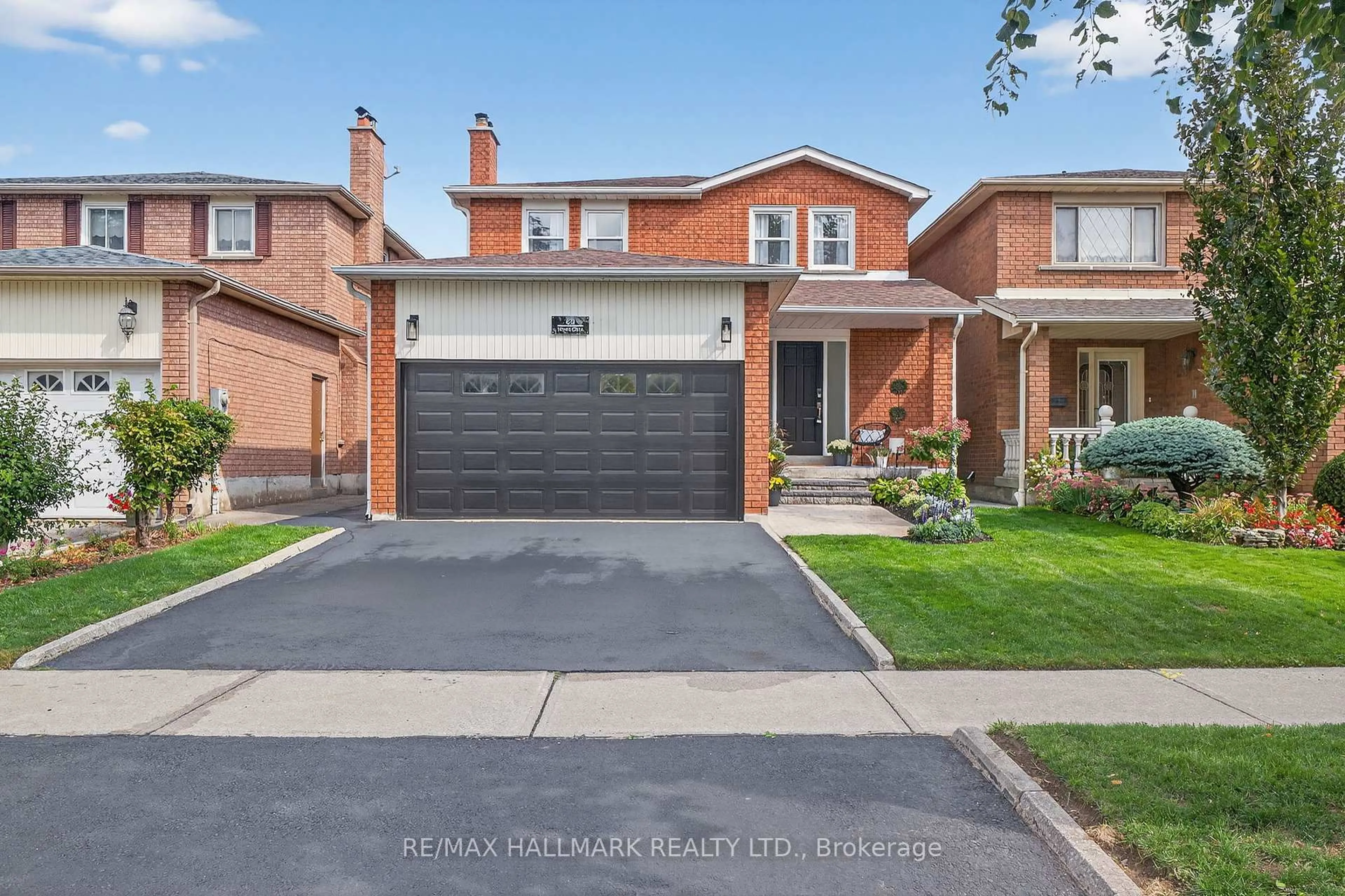 Home with brick exterior material, street for 69 Wade Gate, Vaughan Ontario L4J 5X5