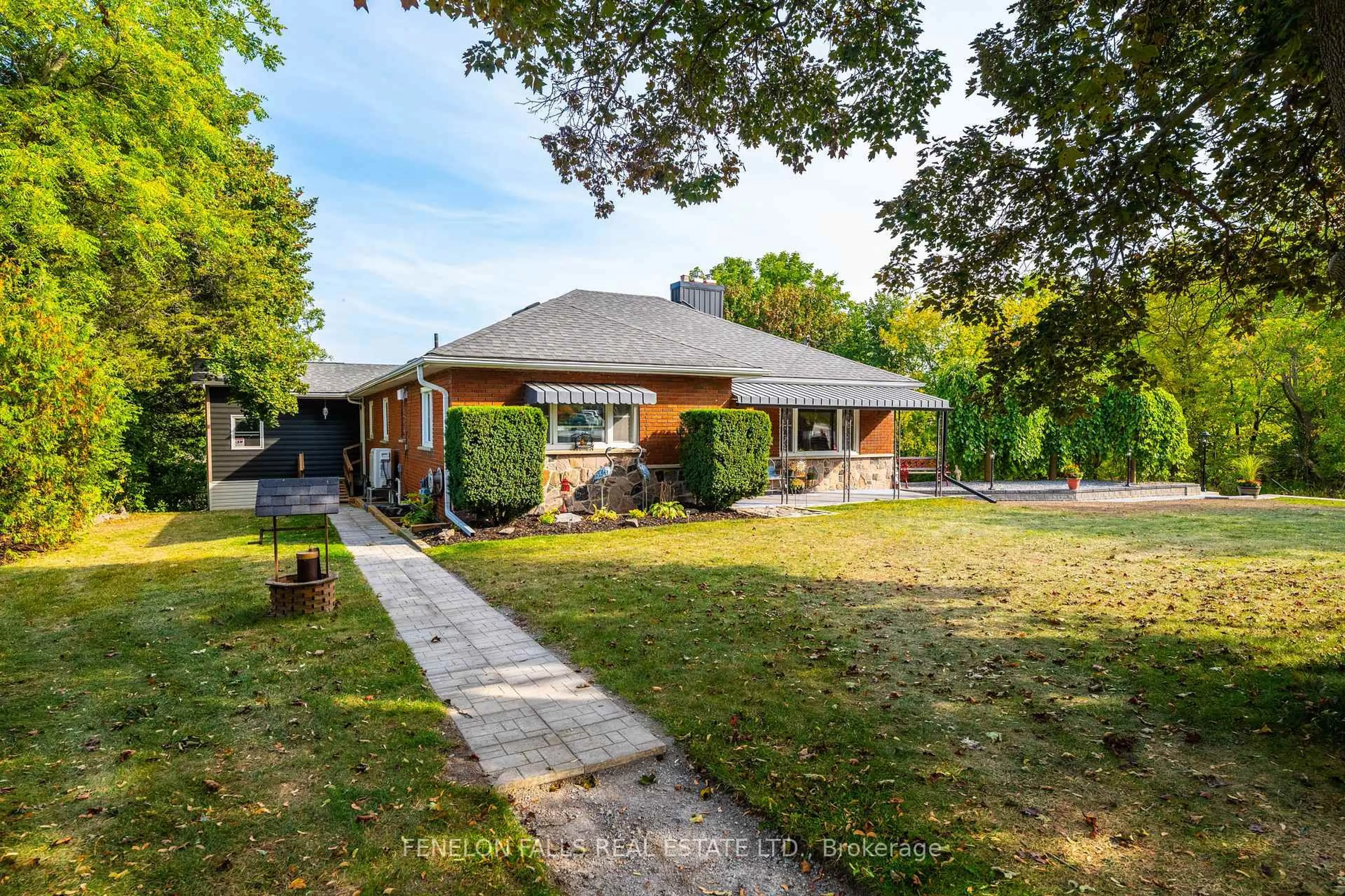 Home with brick exterior material, street for 63 The Queensway N, Georgina Ontario L4P 0L2