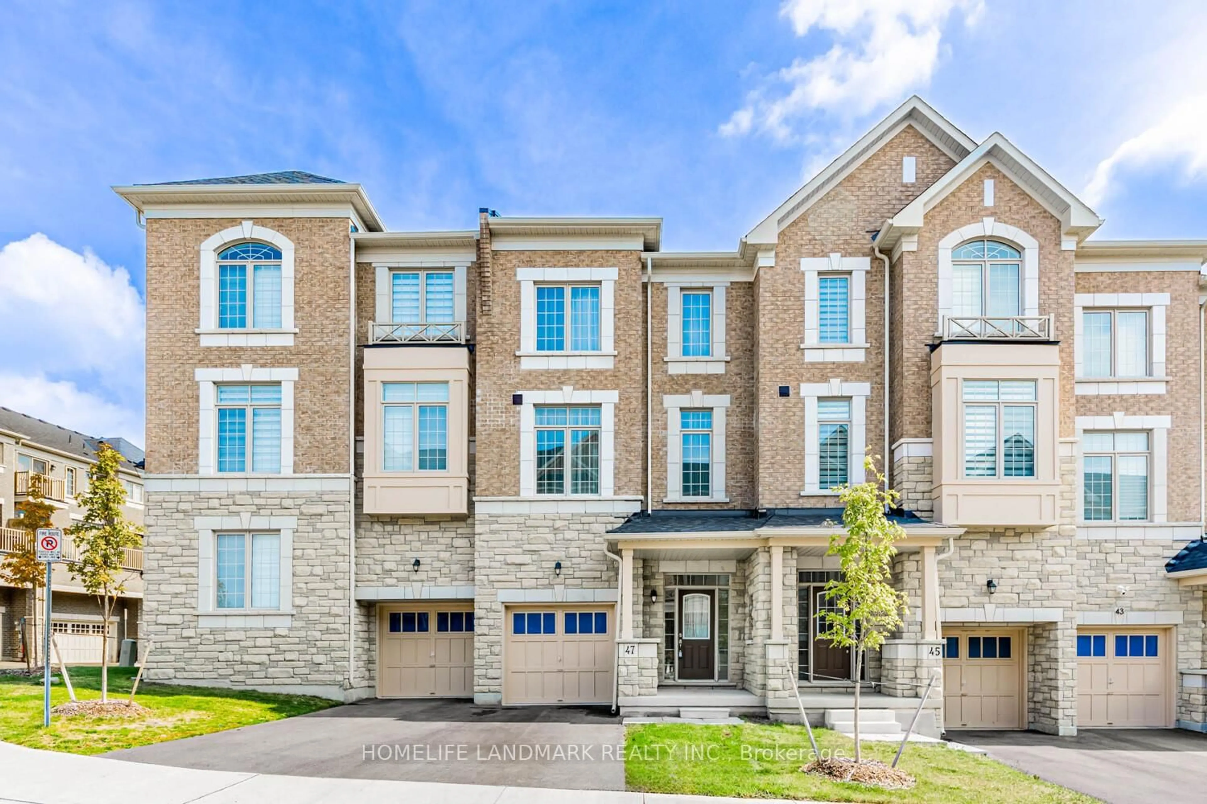 Home with brick exterior material, street for 47 Andress Way, Markham Ontario L3S 0E9