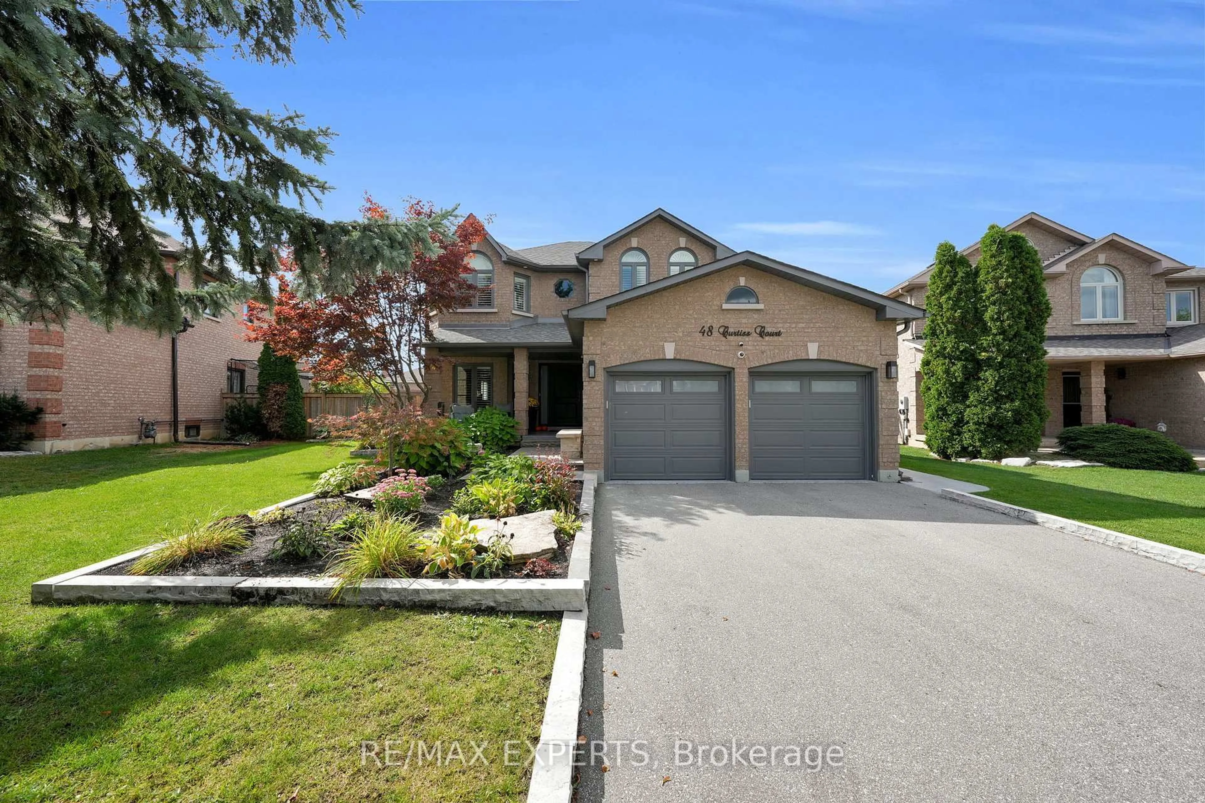 Home with brick exterior material, street for 48 Curtiss Crt, Vaughan Ontario L6A 1Y4