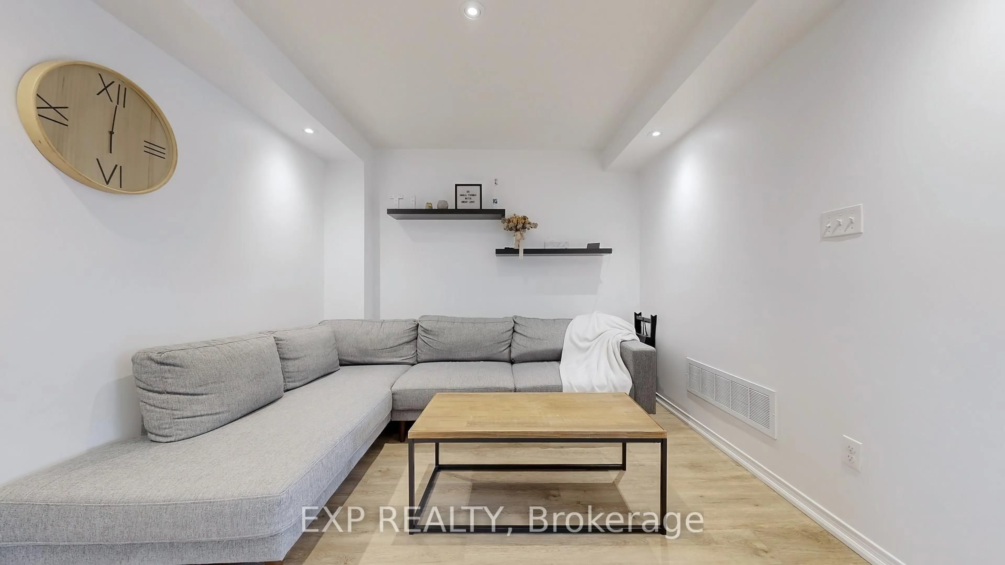 Living room with furniture, wood/laminate floor for 208 Lageer Dr, Whitchurch-Stouffville Ontario L4A 0X1