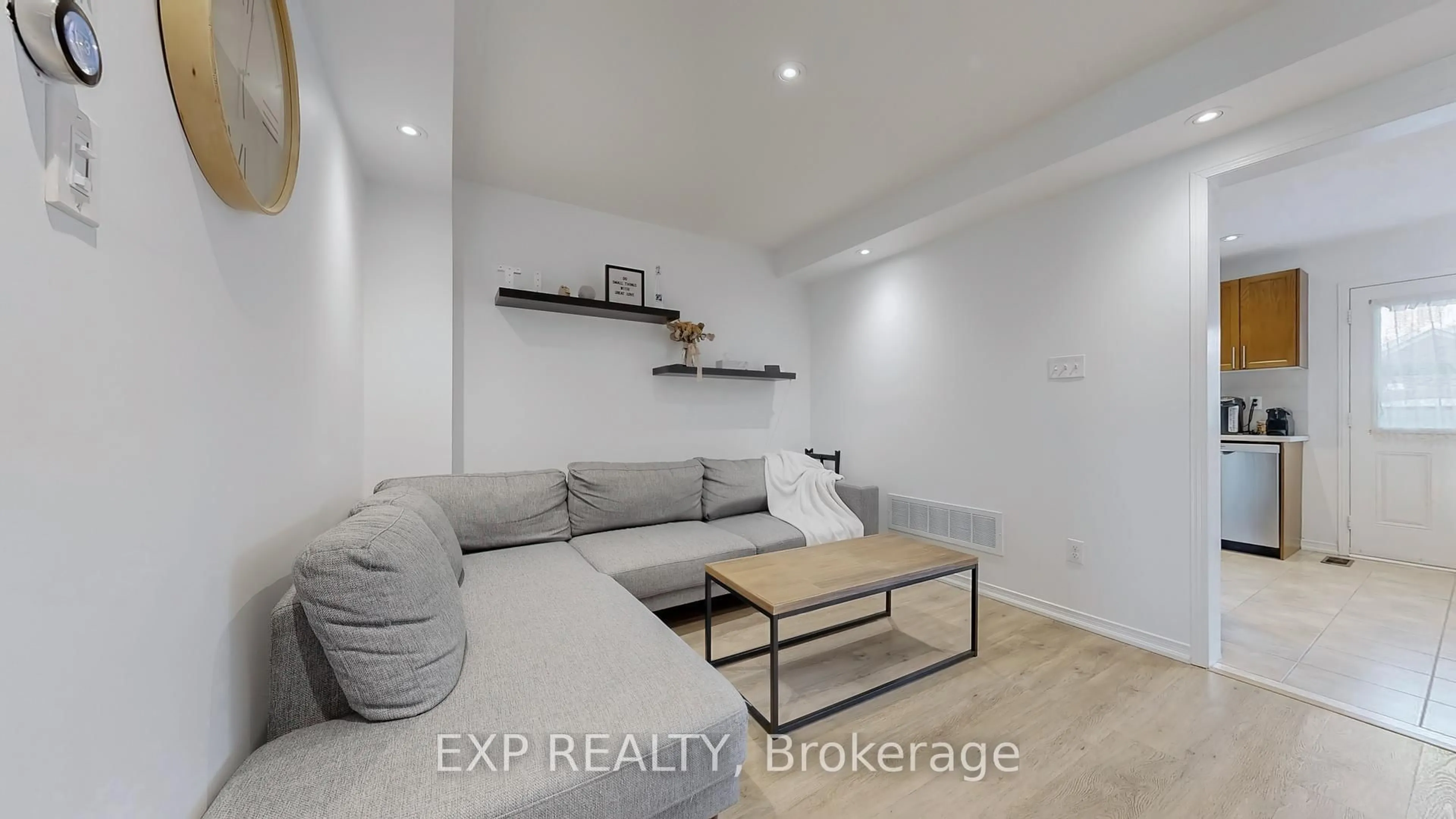 Living room with furniture, wood/laminate floor for 208 Lageer Dr, Whitchurch-Stouffville Ontario L4A 0X1